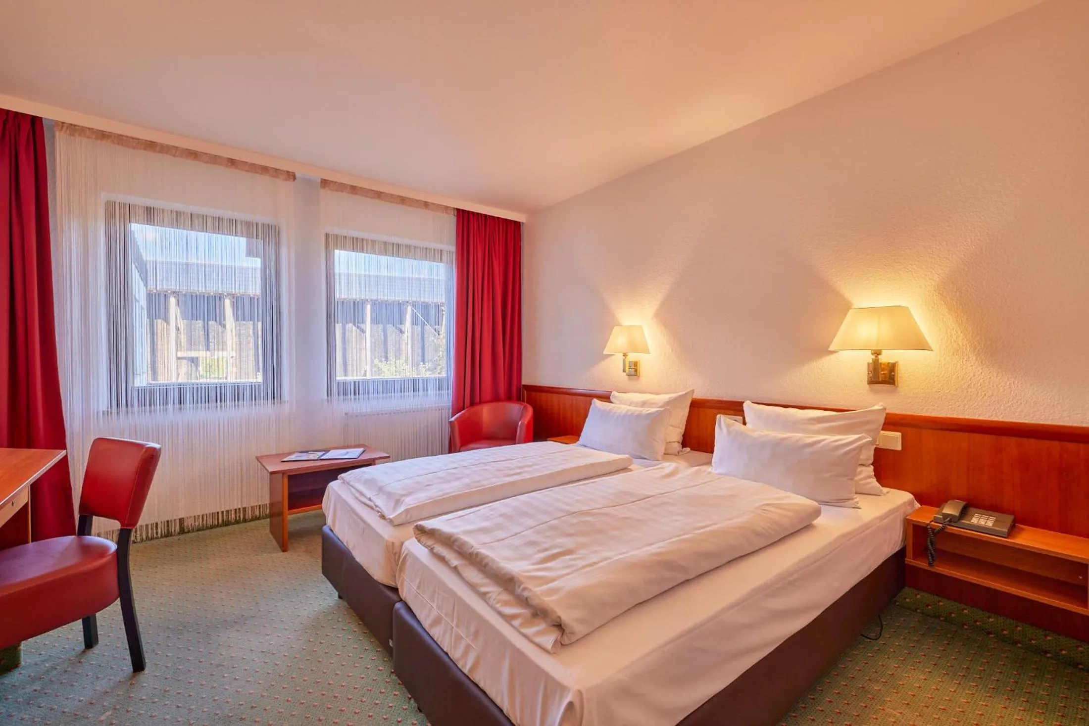Photo of the whole room, Bed in Mercure Hotel Bad Duerkheim An Den Salinen