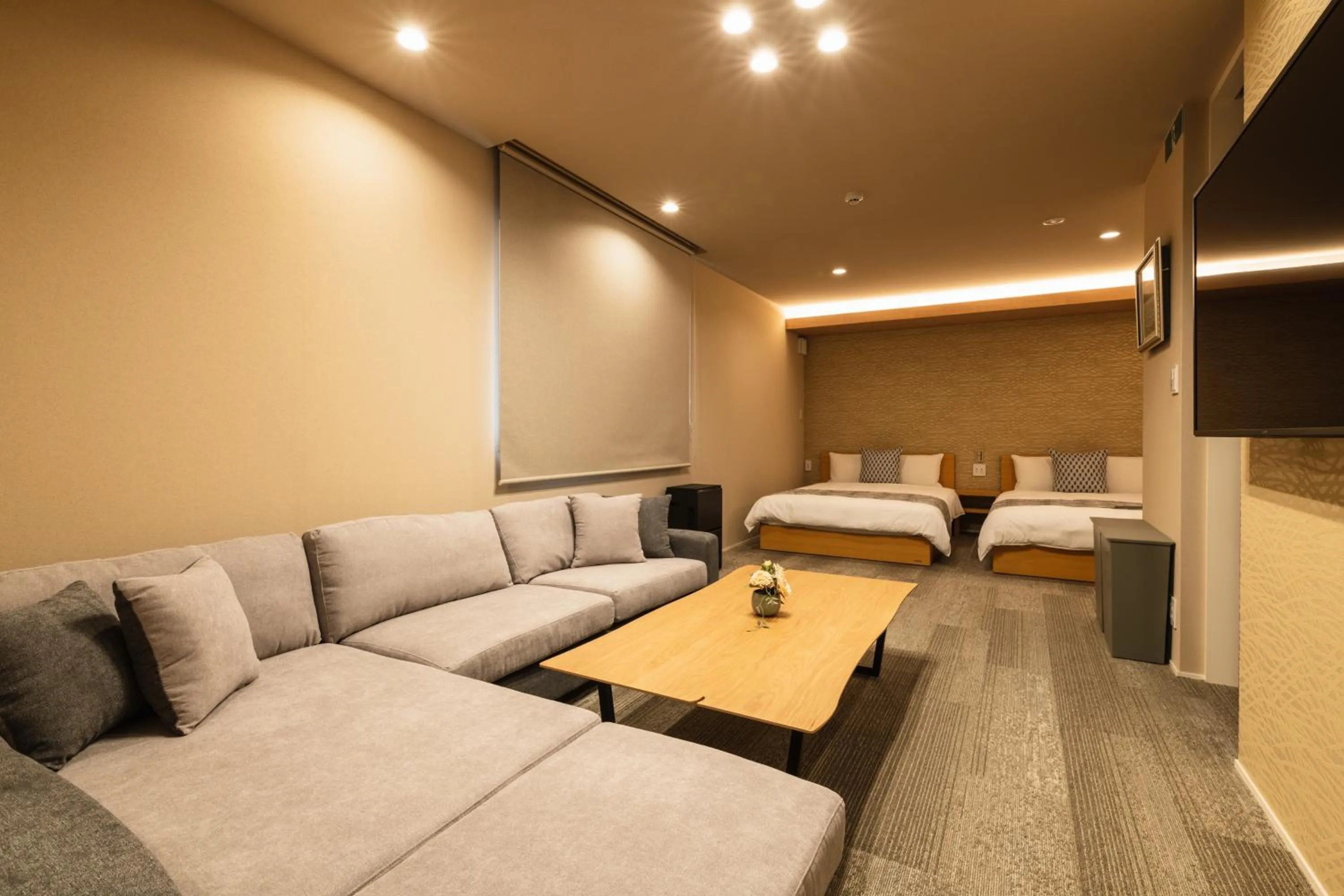 Seating area, Bed in GRAND BASE Urakami