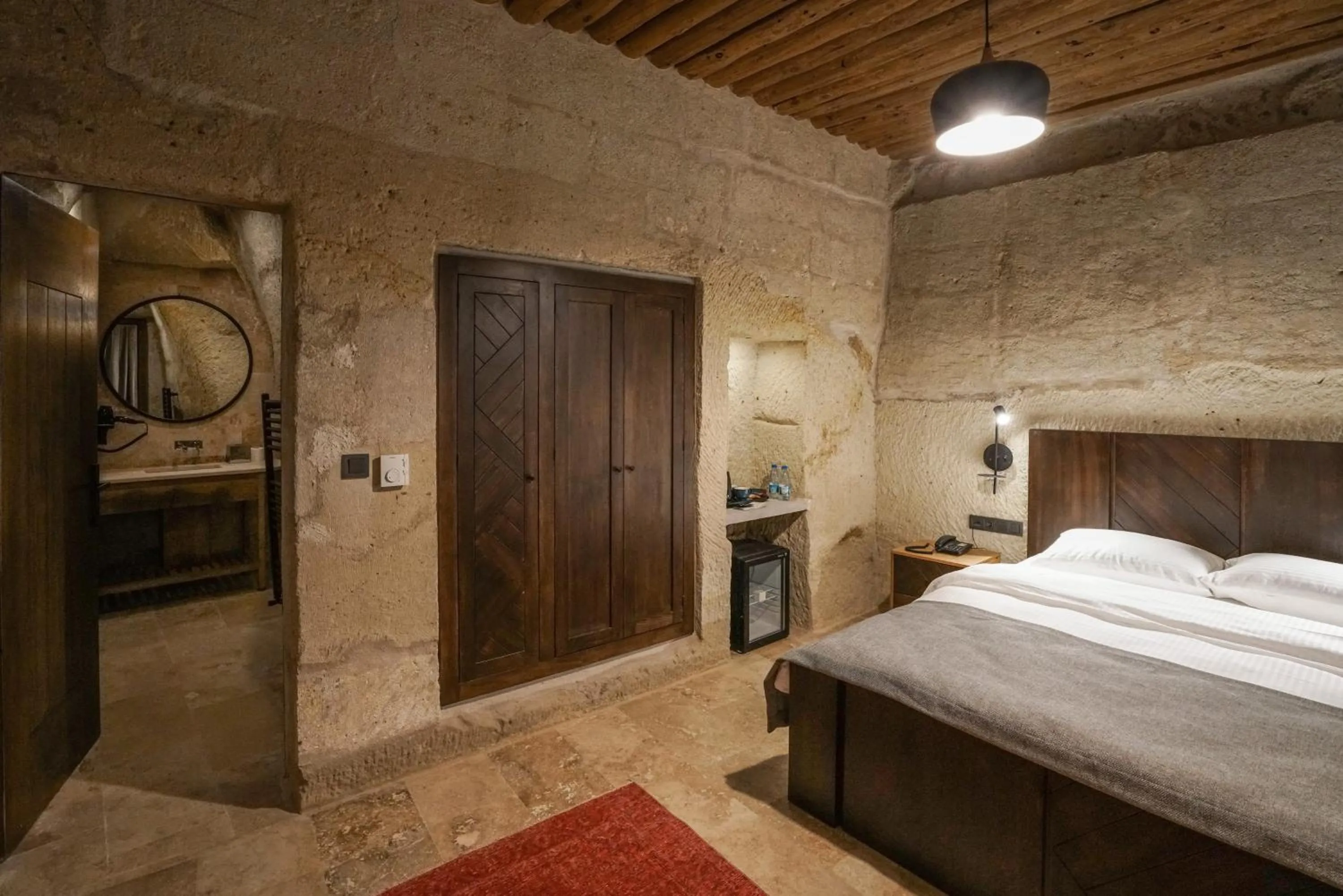 Toilet, Bed in Luvi Cave Hotel