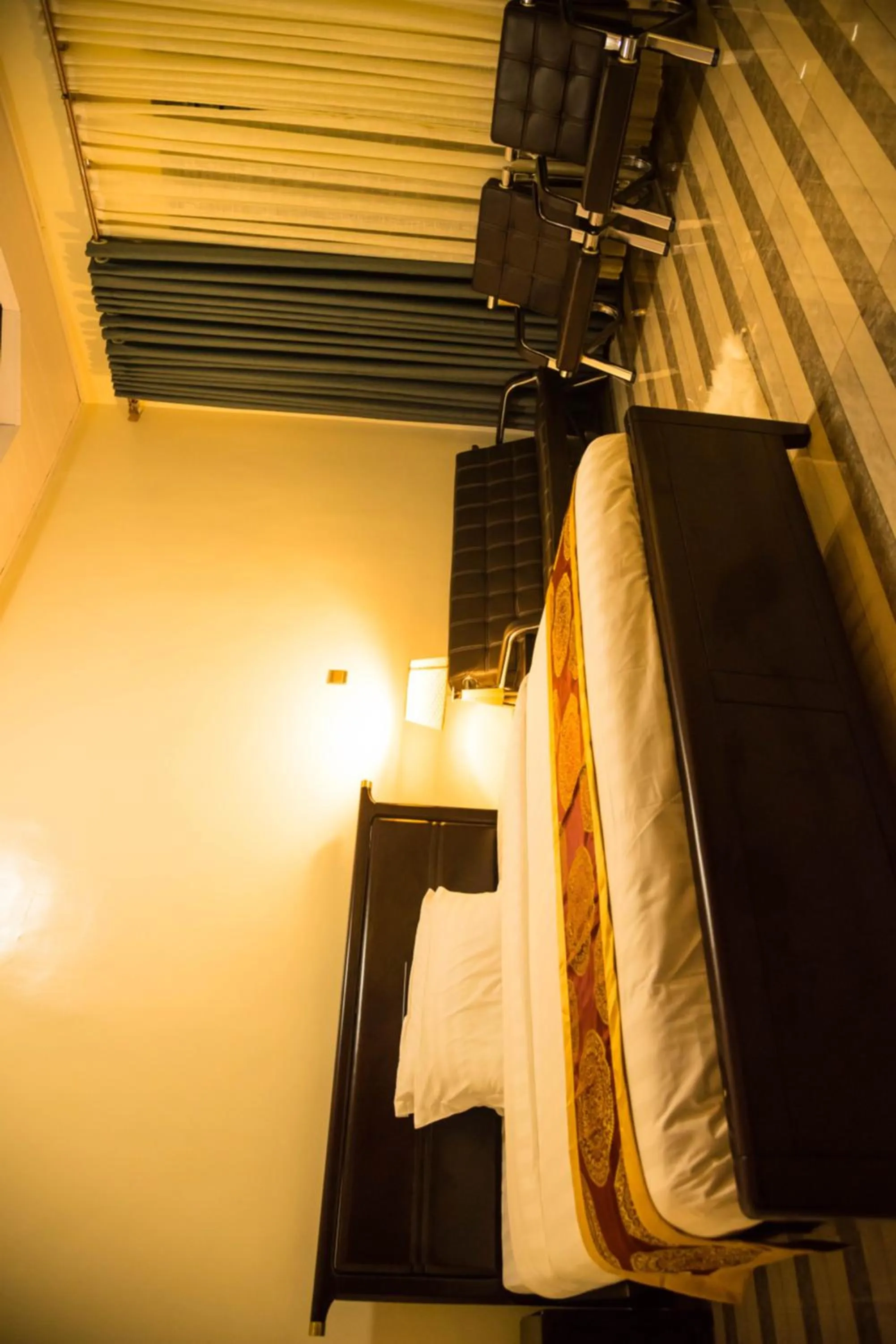 Bed in AVISHA TOWN HOTEL