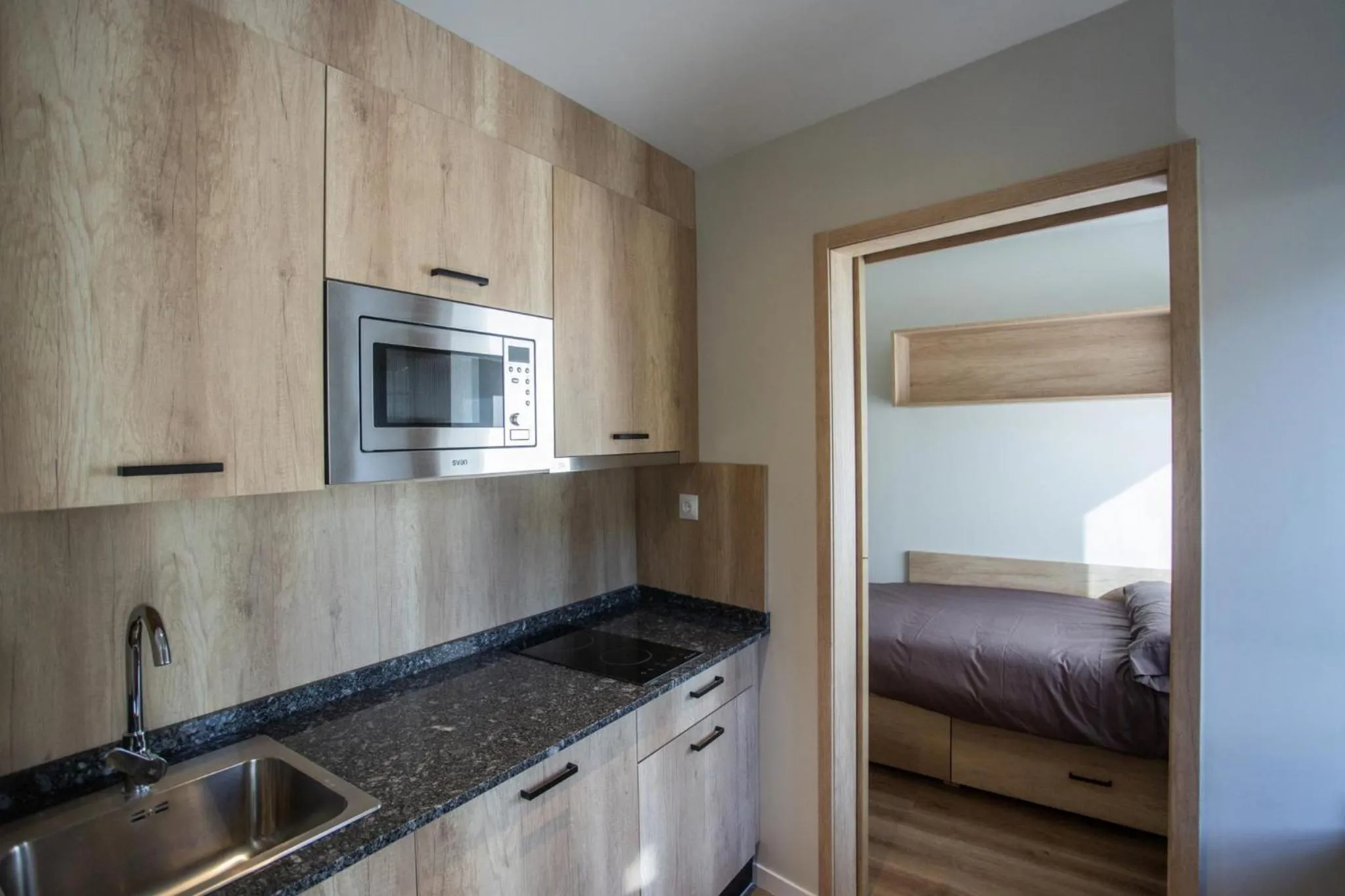 Communal kitchen, Bed in Micampus Bilbao Student Residence