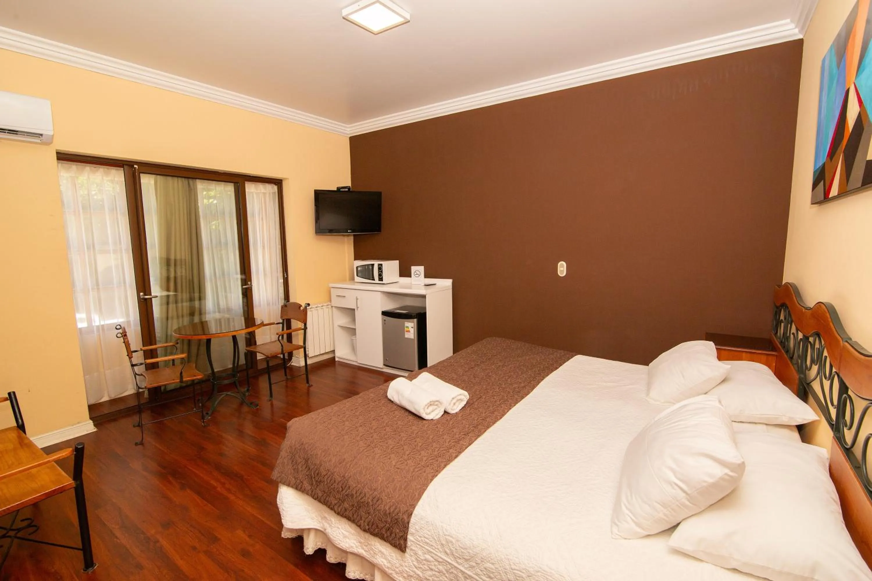 Bed in Hotel Inti Kuyen Plaza