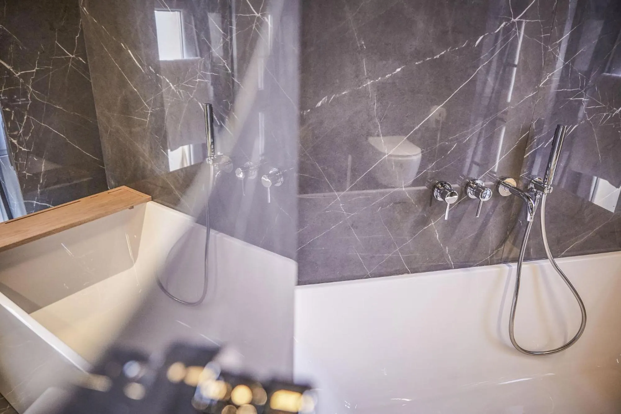 Bathroom in Hotel ONIRO - Luxury Rooms & Wellness Suites