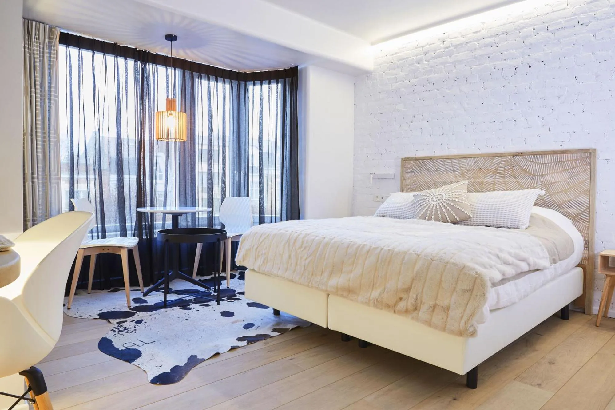 Bed in Hotel ONIRO - Luxury Rooms & Wellness Suites