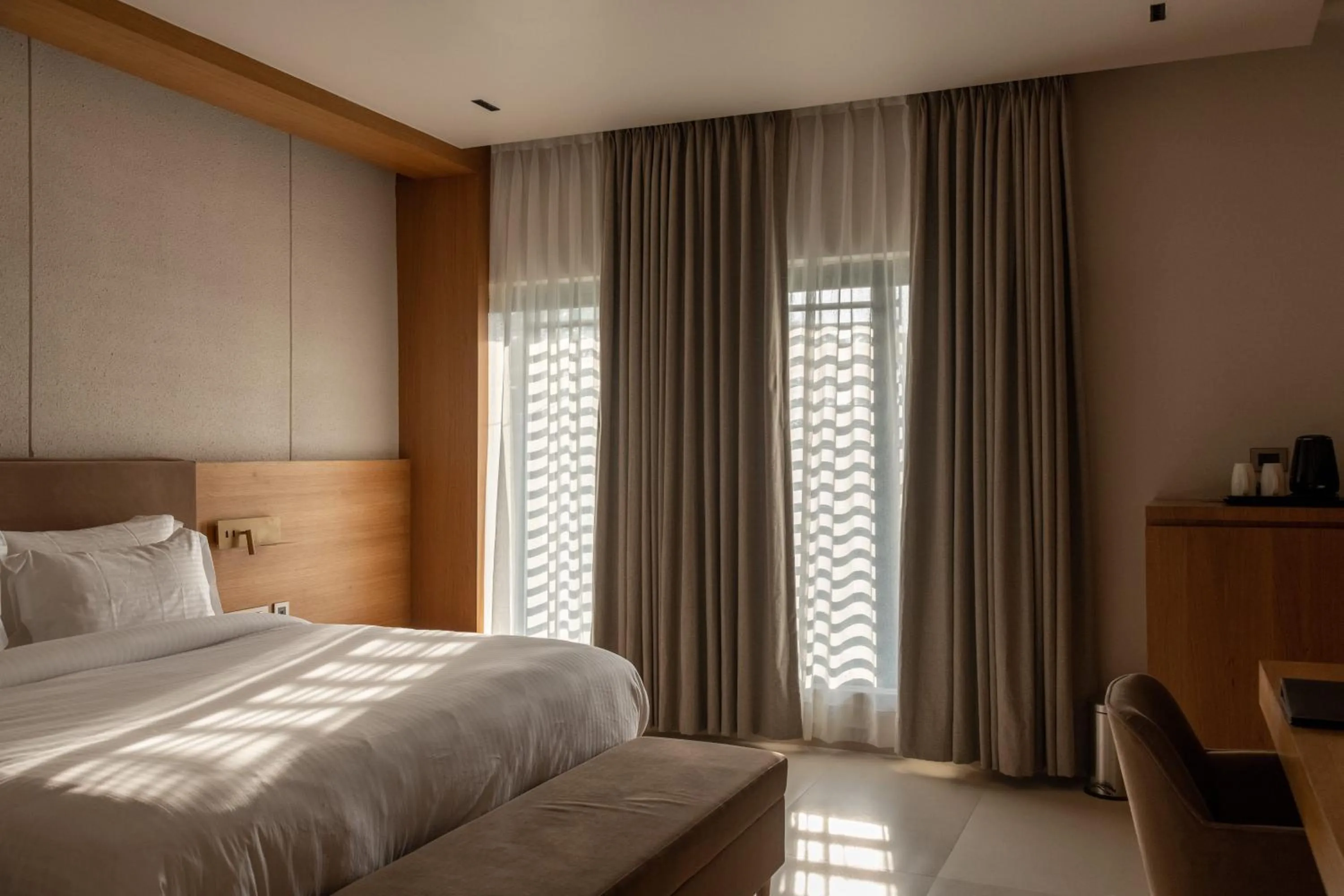 Bed in Naturoville Wellness Resort Rishikesh - Surrounded by Nature, Rooted in Wellness