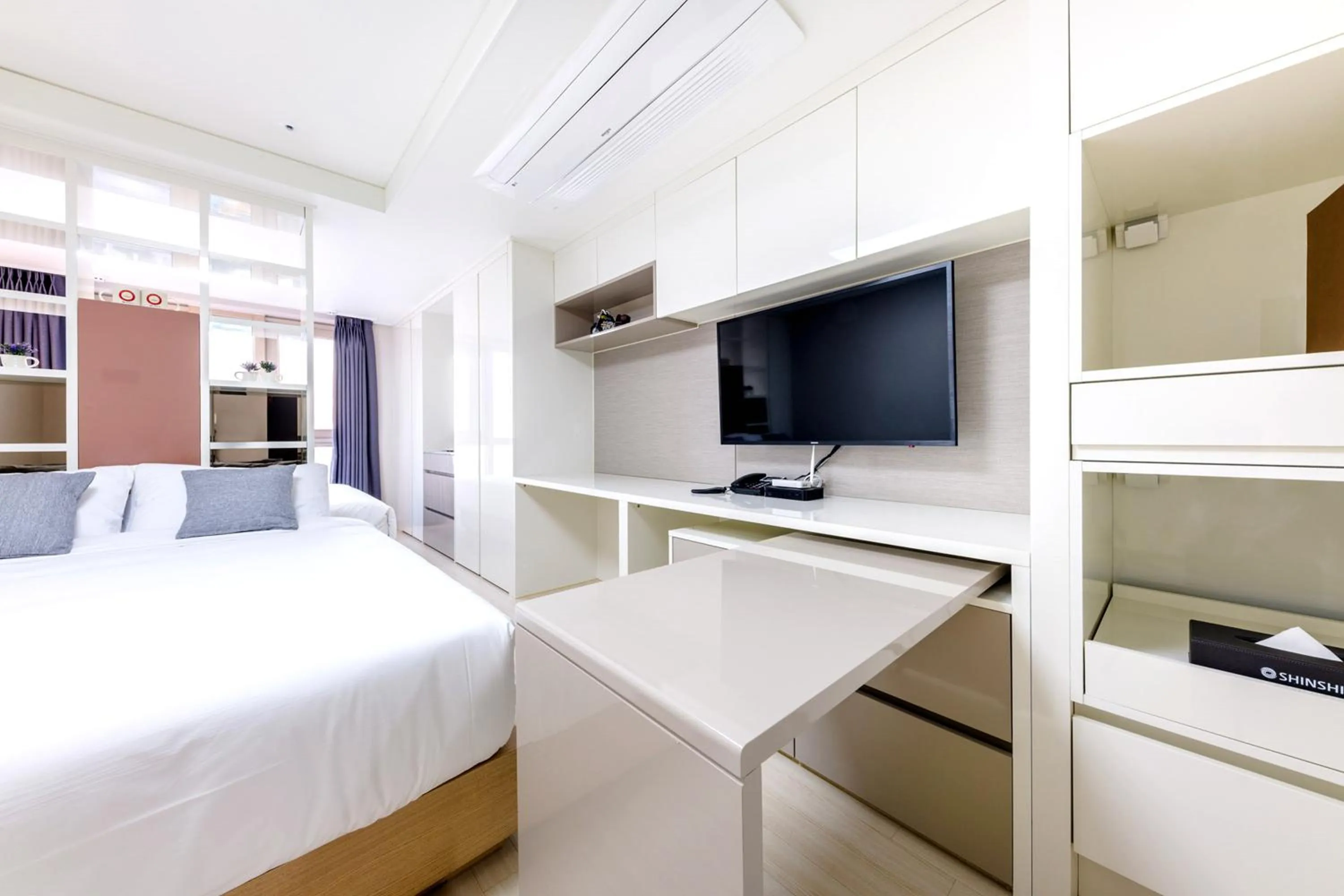 Property building, Bed in Shin Shin Hotel Seogwipo