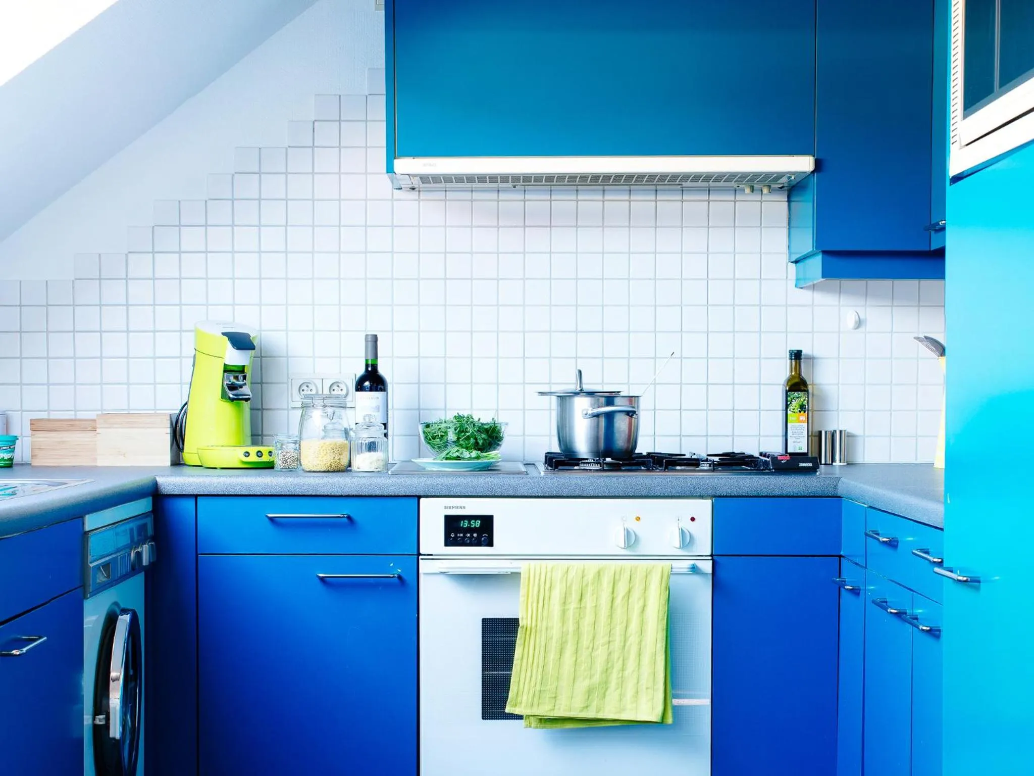 Kitchen or kitchenette in B&B Place Jourdan