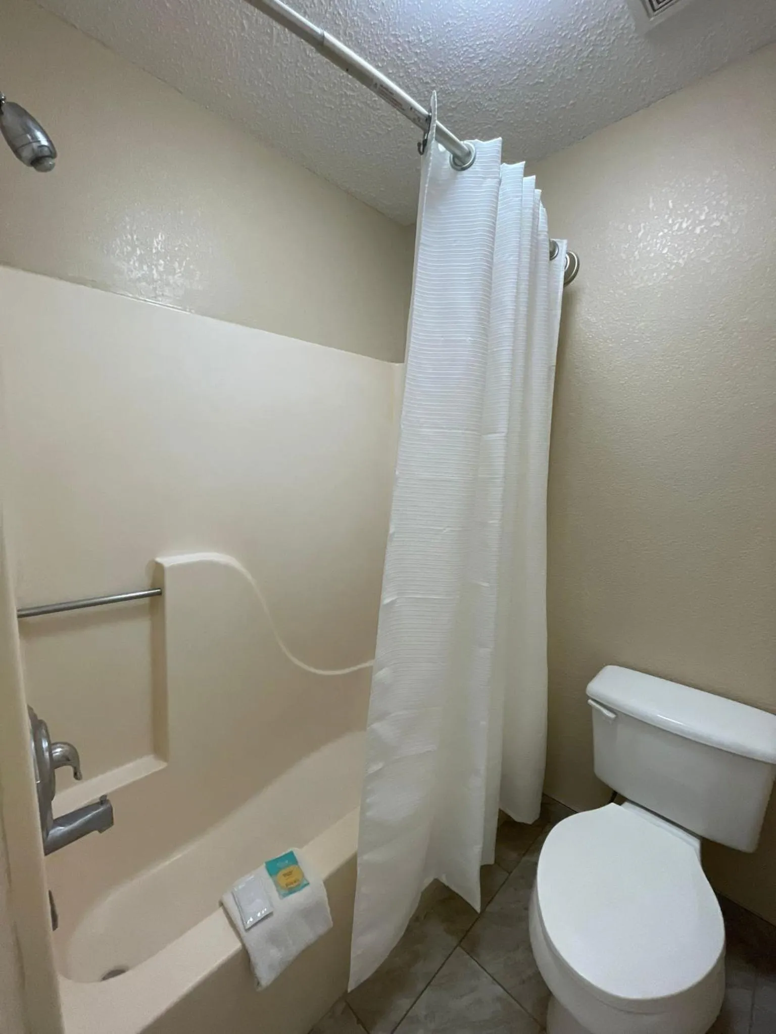Shower in DELUXE INN