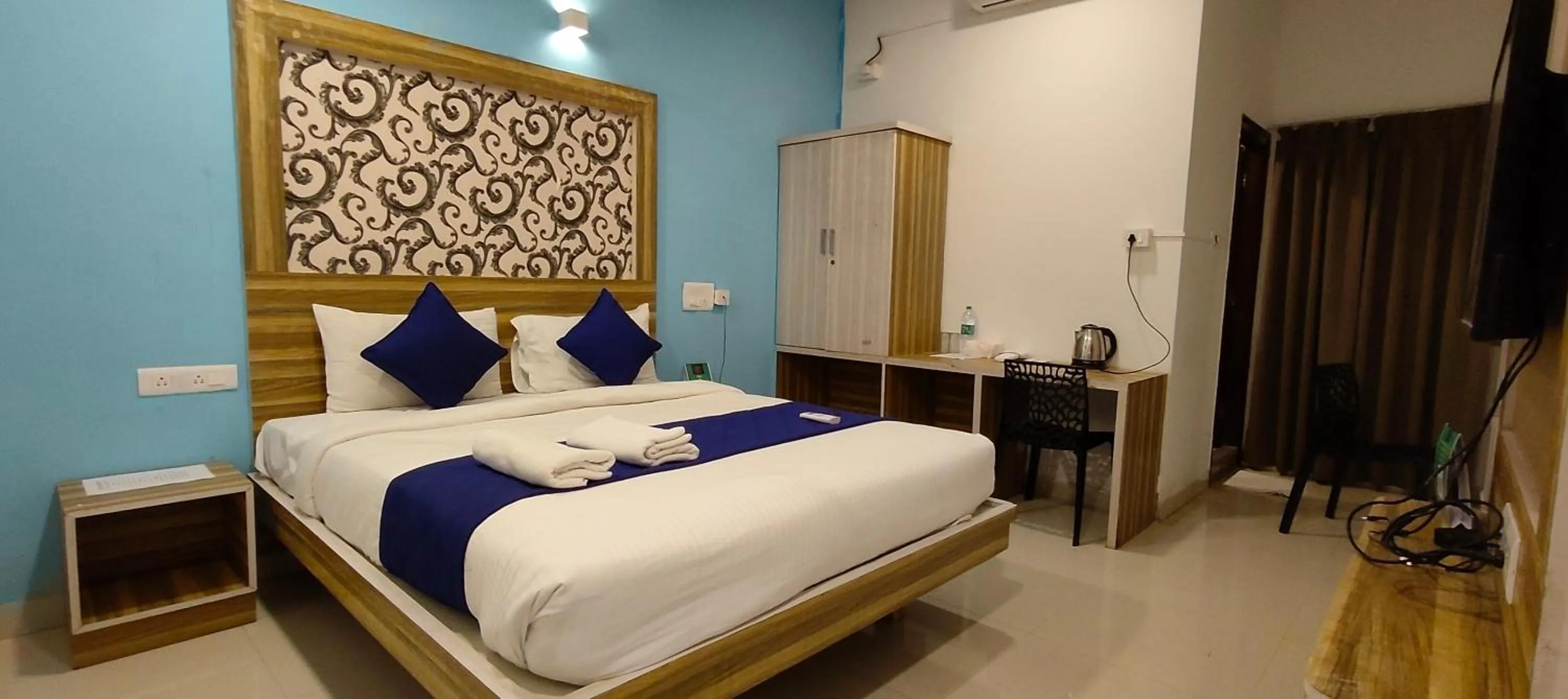 Bed in Hotel Dhruv Palace Bangalore Jakkur