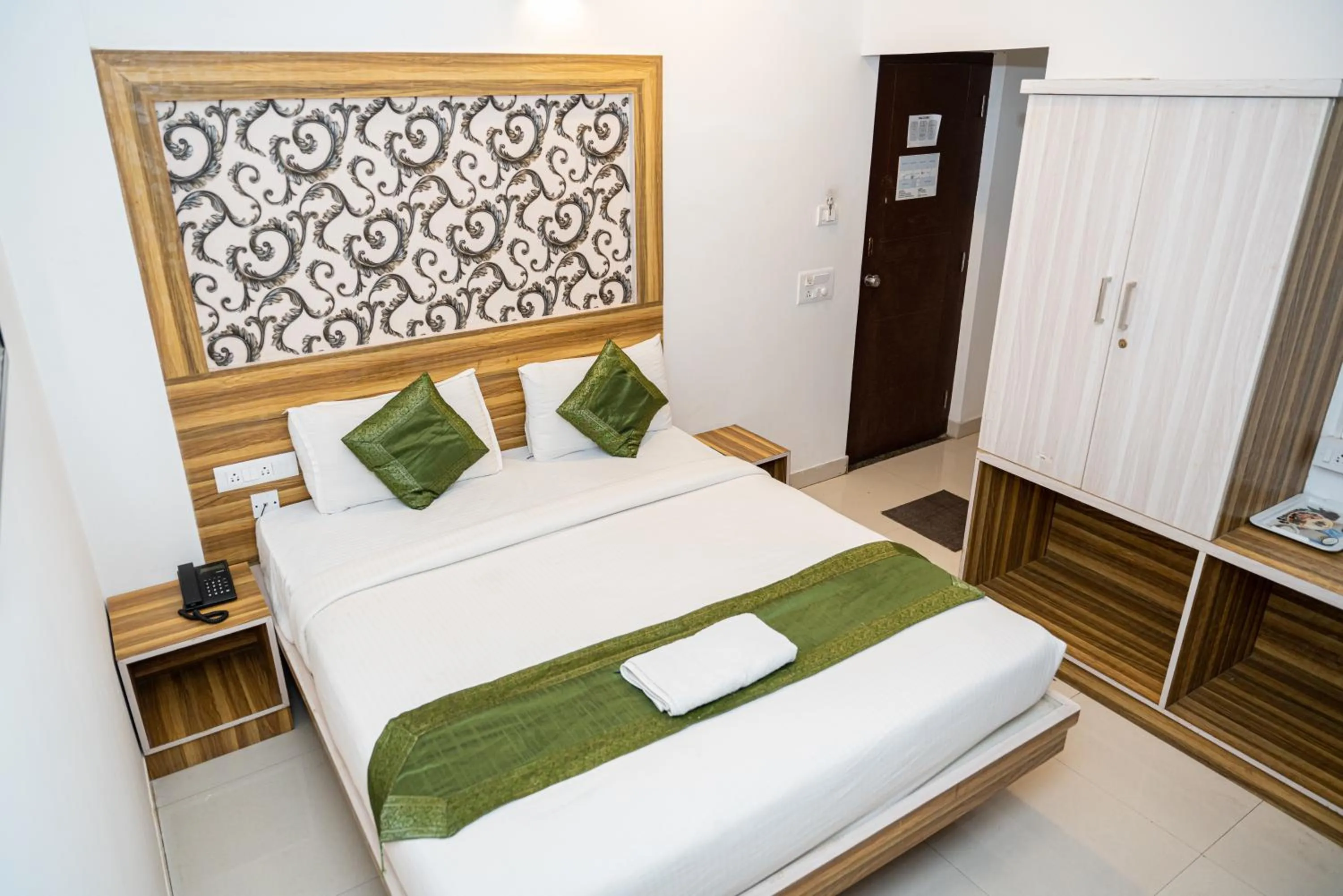 Bed in Hotel Dhruv Palace Bangalore Jakkur