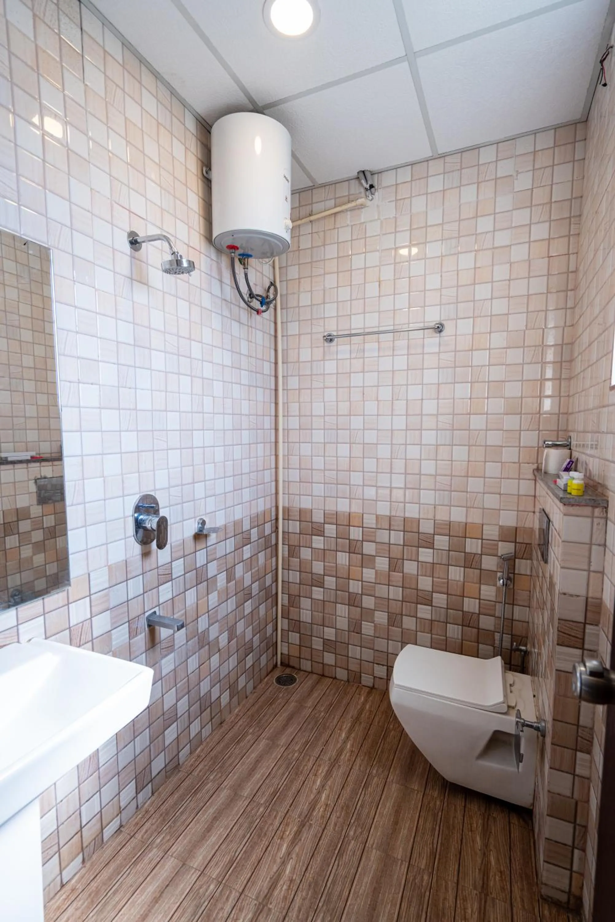 Bathroom in Hotel Dhruv Palace Bangalore Jakkur