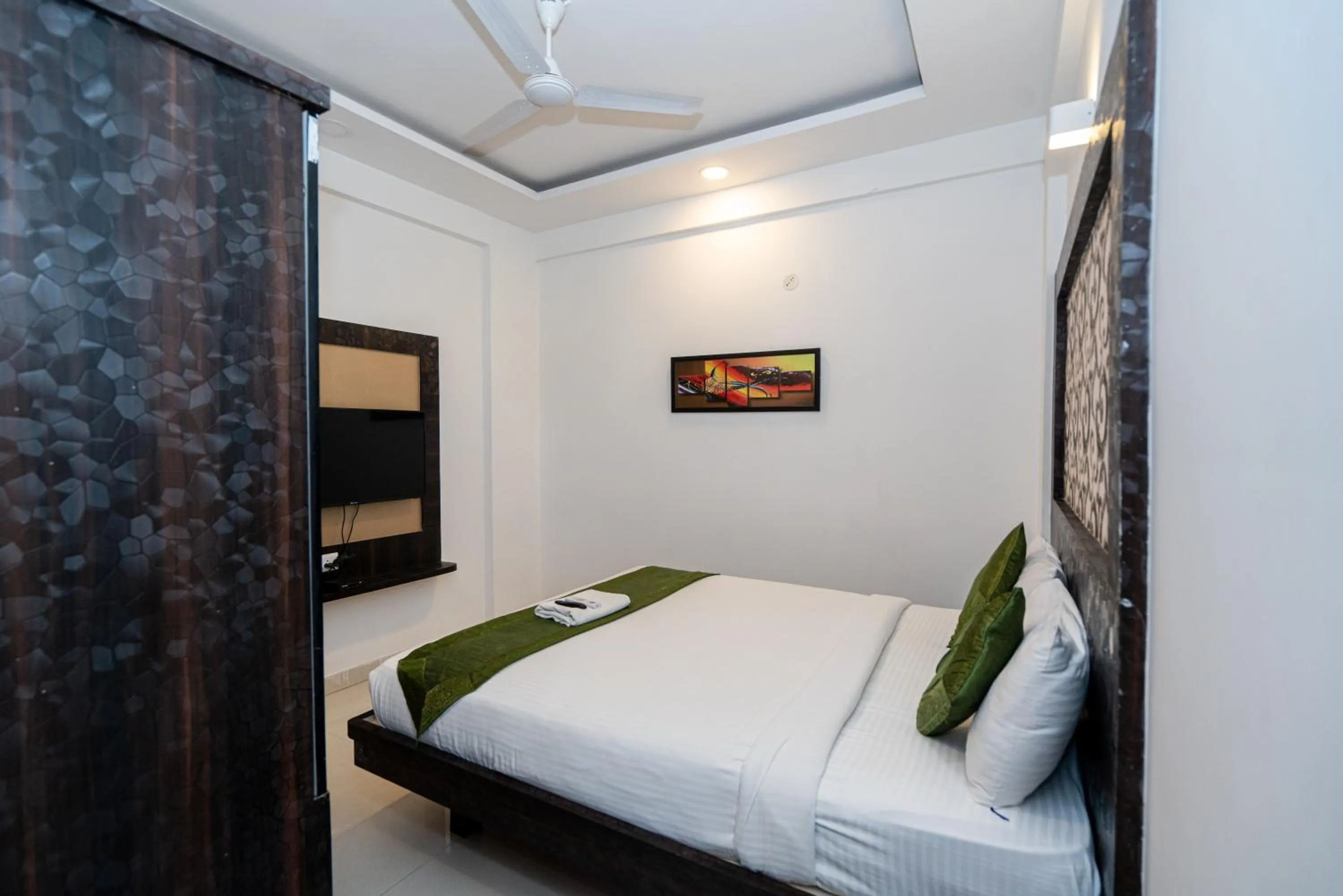 Photo of the whole room, Bed in Hotel Dhruv Palace Bangalore Jakkur