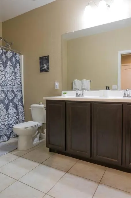 Gated townhouse with 2 suites, heated pool, hot tub