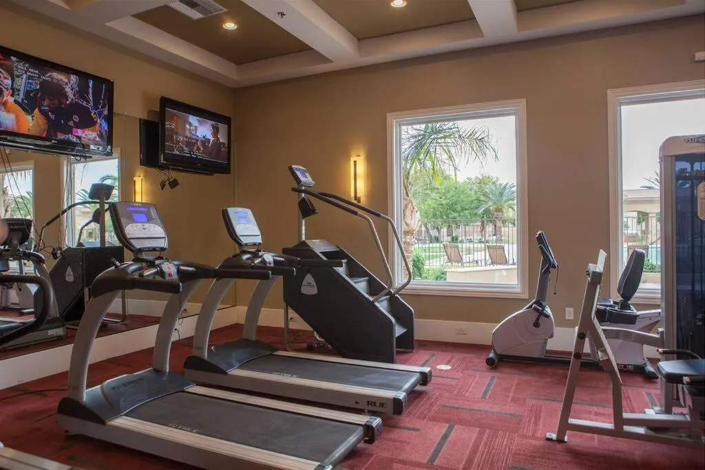 Gated townhouse with 2 suites, heated pool, hot tub