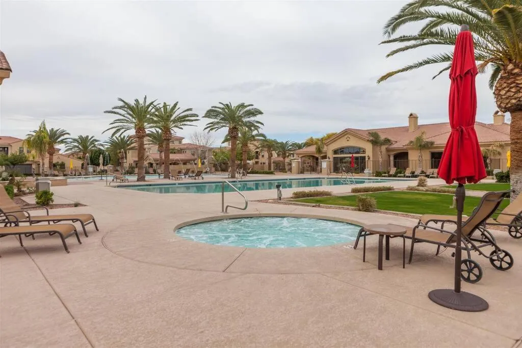 Gated townhouse with 2 suites, heated pool, hot tub