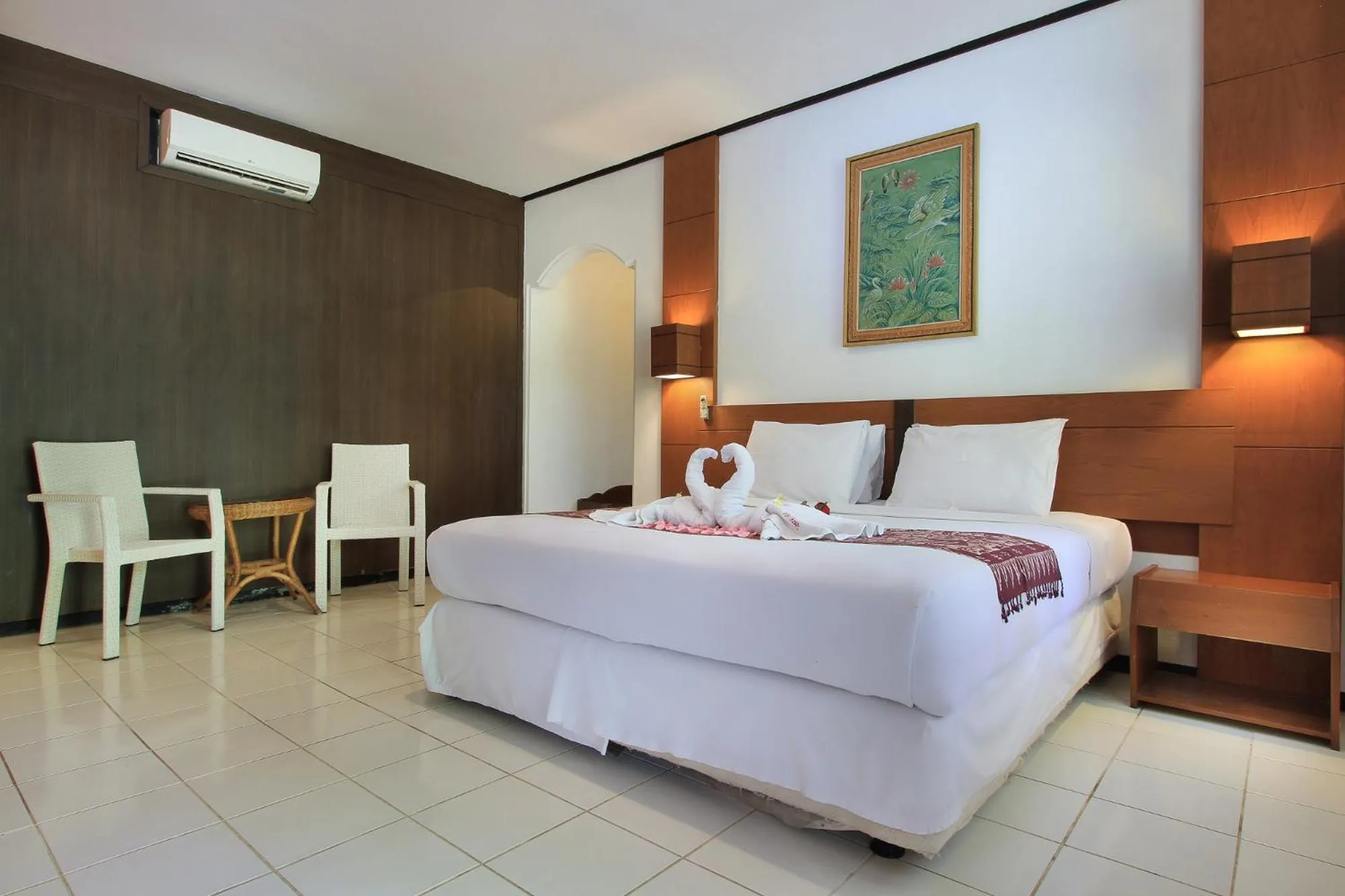 Bed in Puri Naga Beachfront Cottages