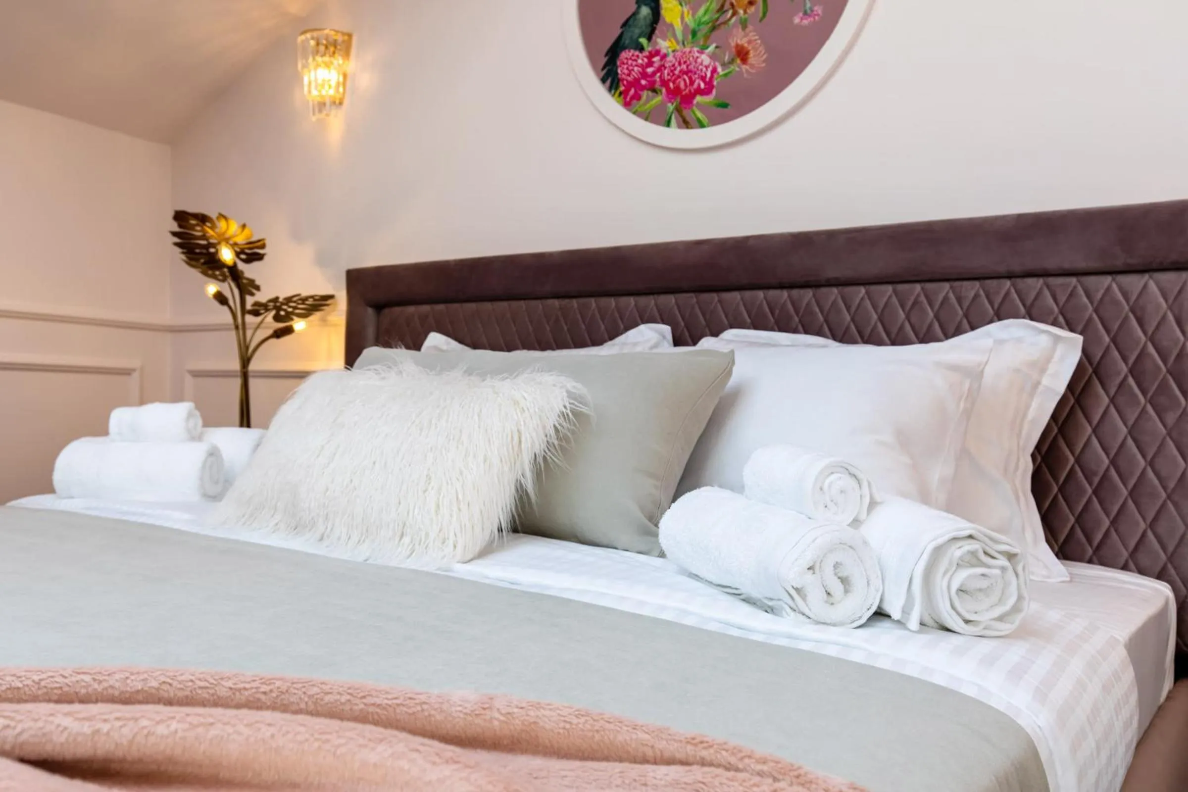 Bed in Old Town Luxury Suites