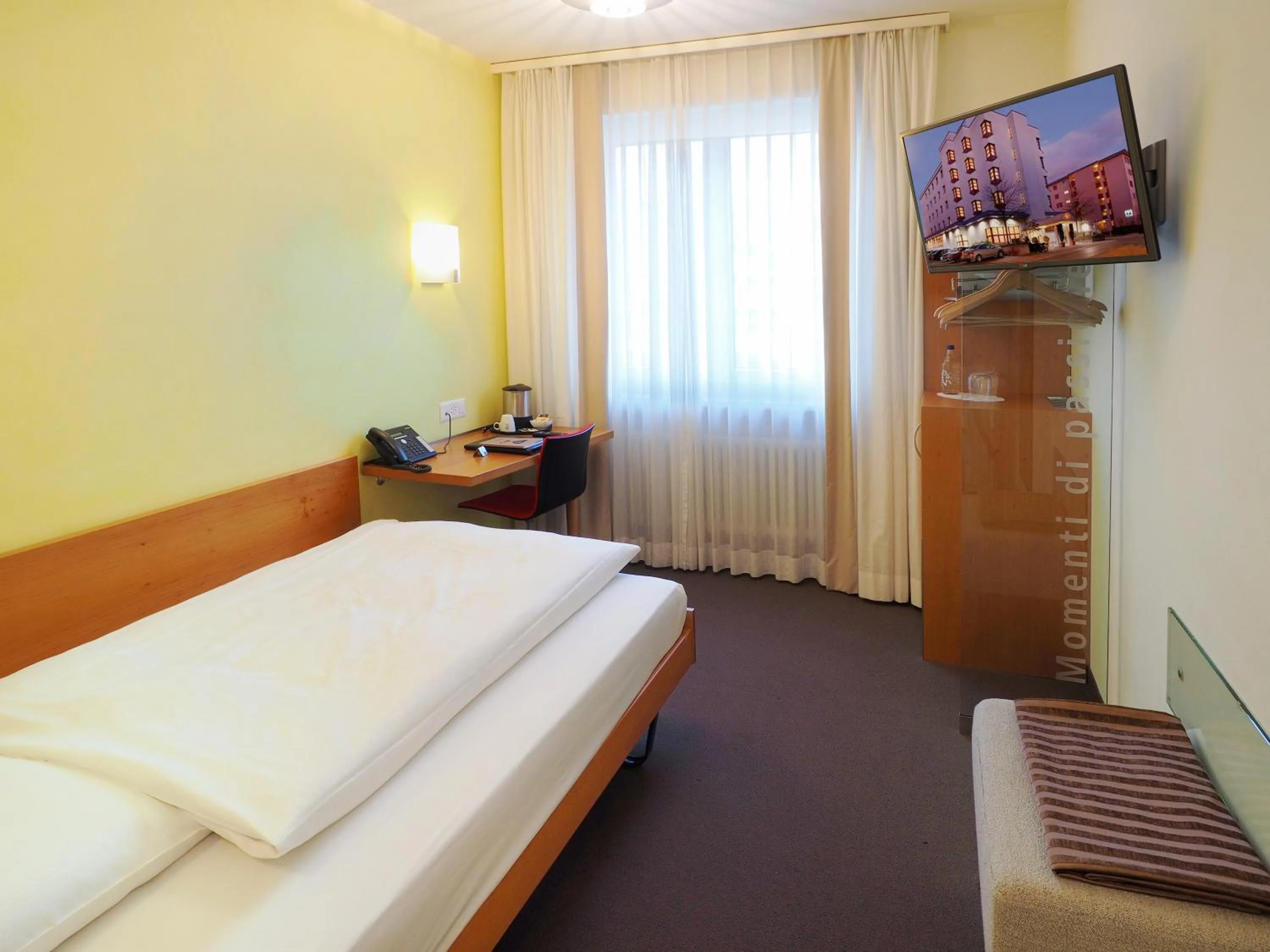 Bedroom, Bed in Sommerau-Ticino Swiss Quality Hotel