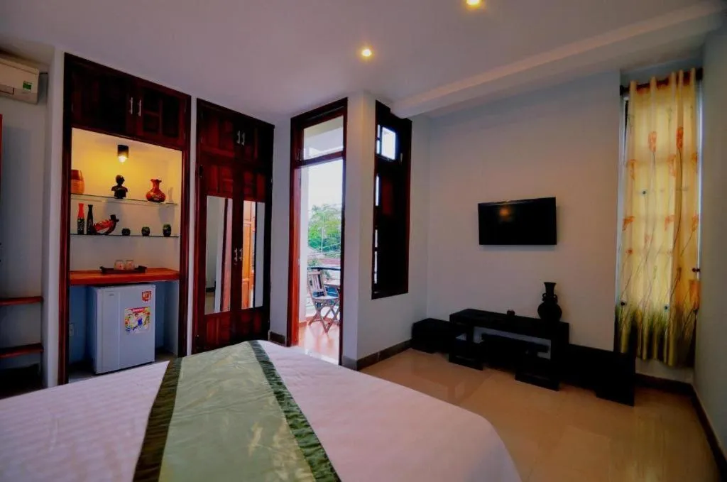 Bed in Starfruit villa Hoi An