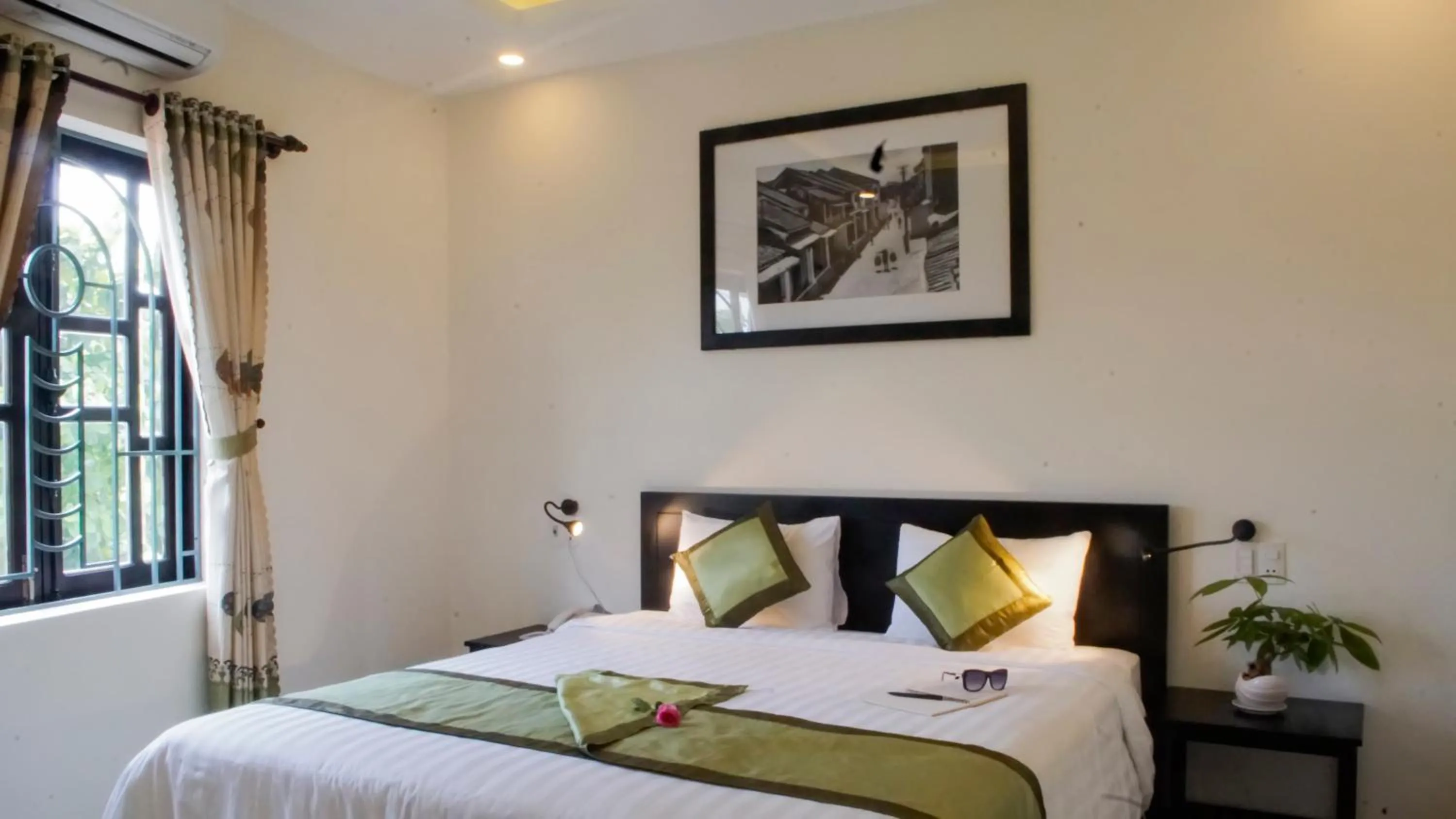 Bed in Starfruit villa Hoi An