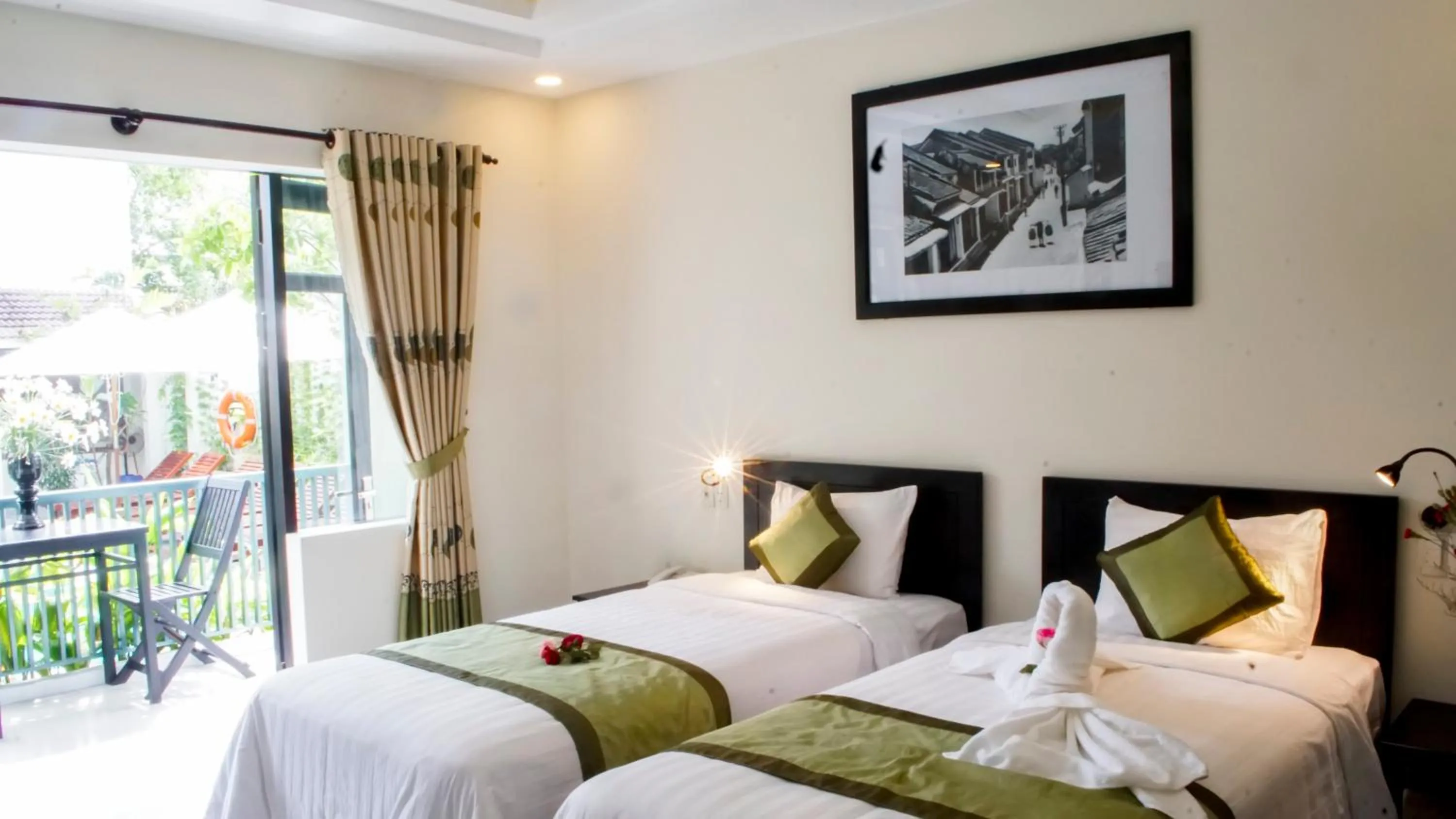 Bed in Starfruit villa Hoi An