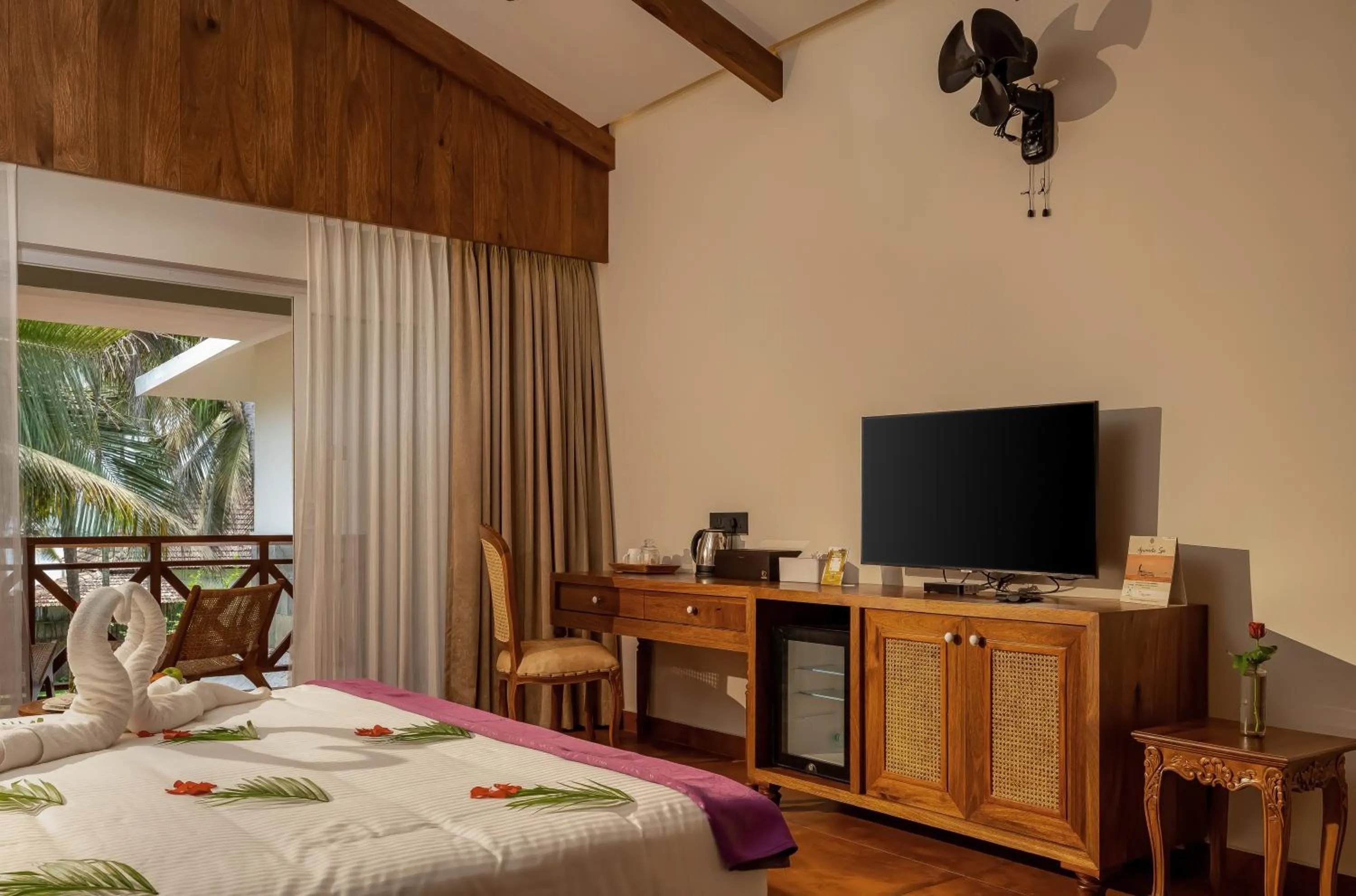 Communal lounge/ TV room, Bed in Malabar Ocean Front Resort And Spa, Bekal