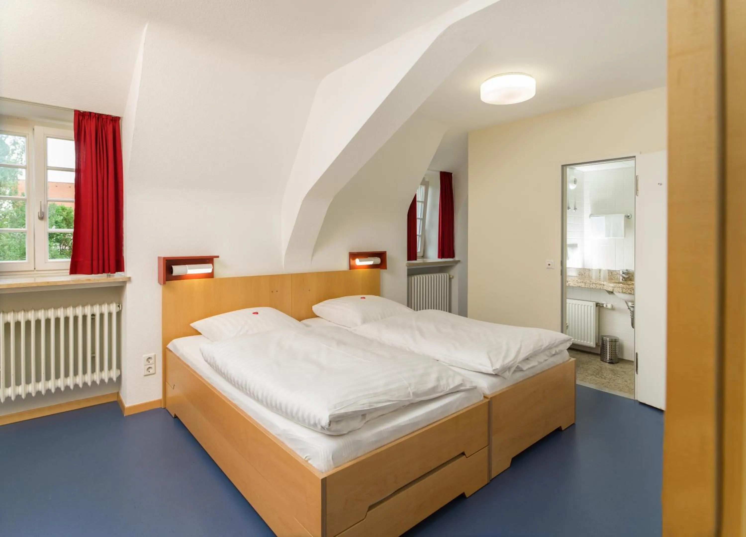 Photo of the whole room, Bed in Bildungshaus Neckarelz