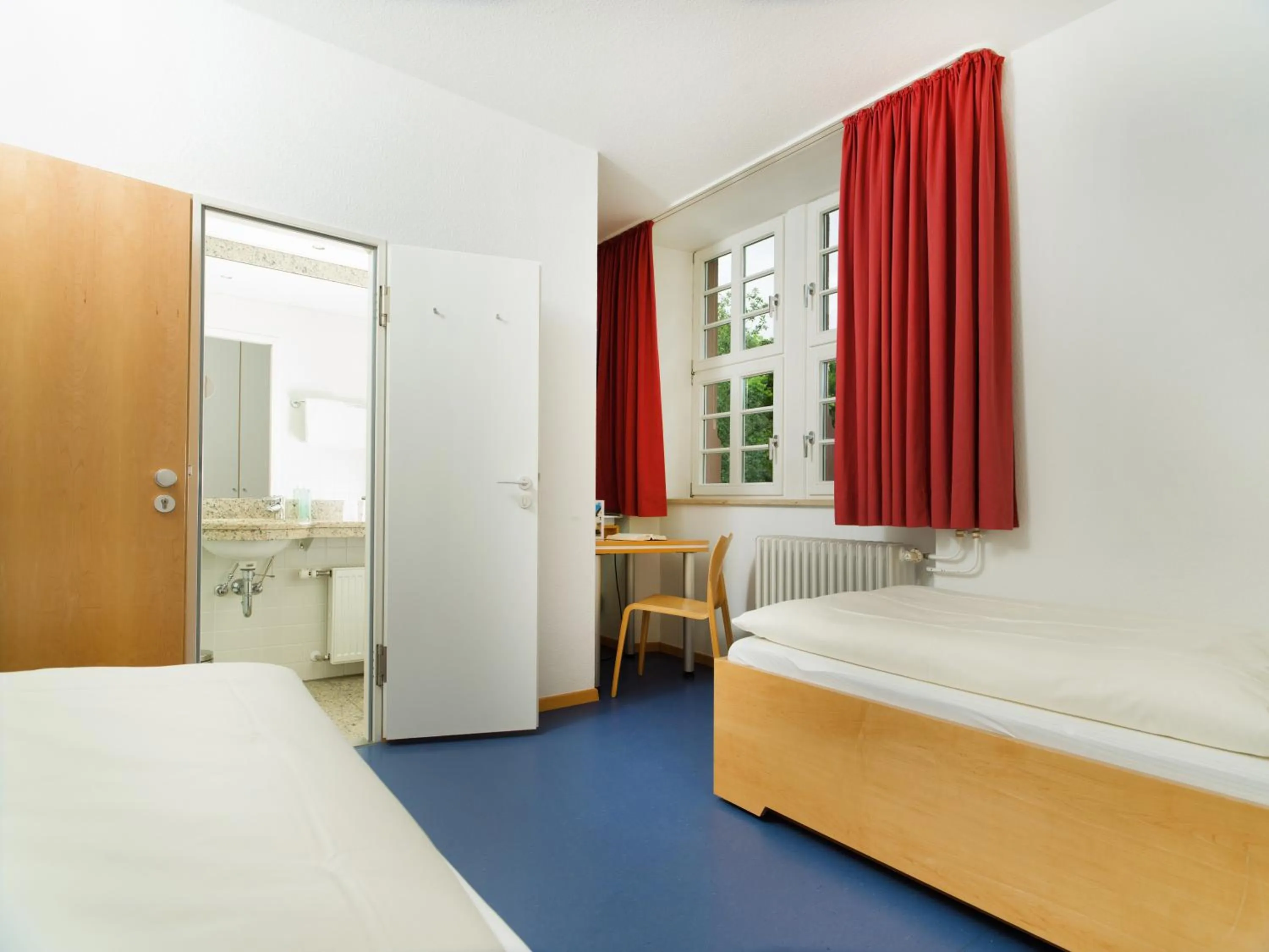 Photo of the whole room, Bed in Bildungshaus Neckarelz