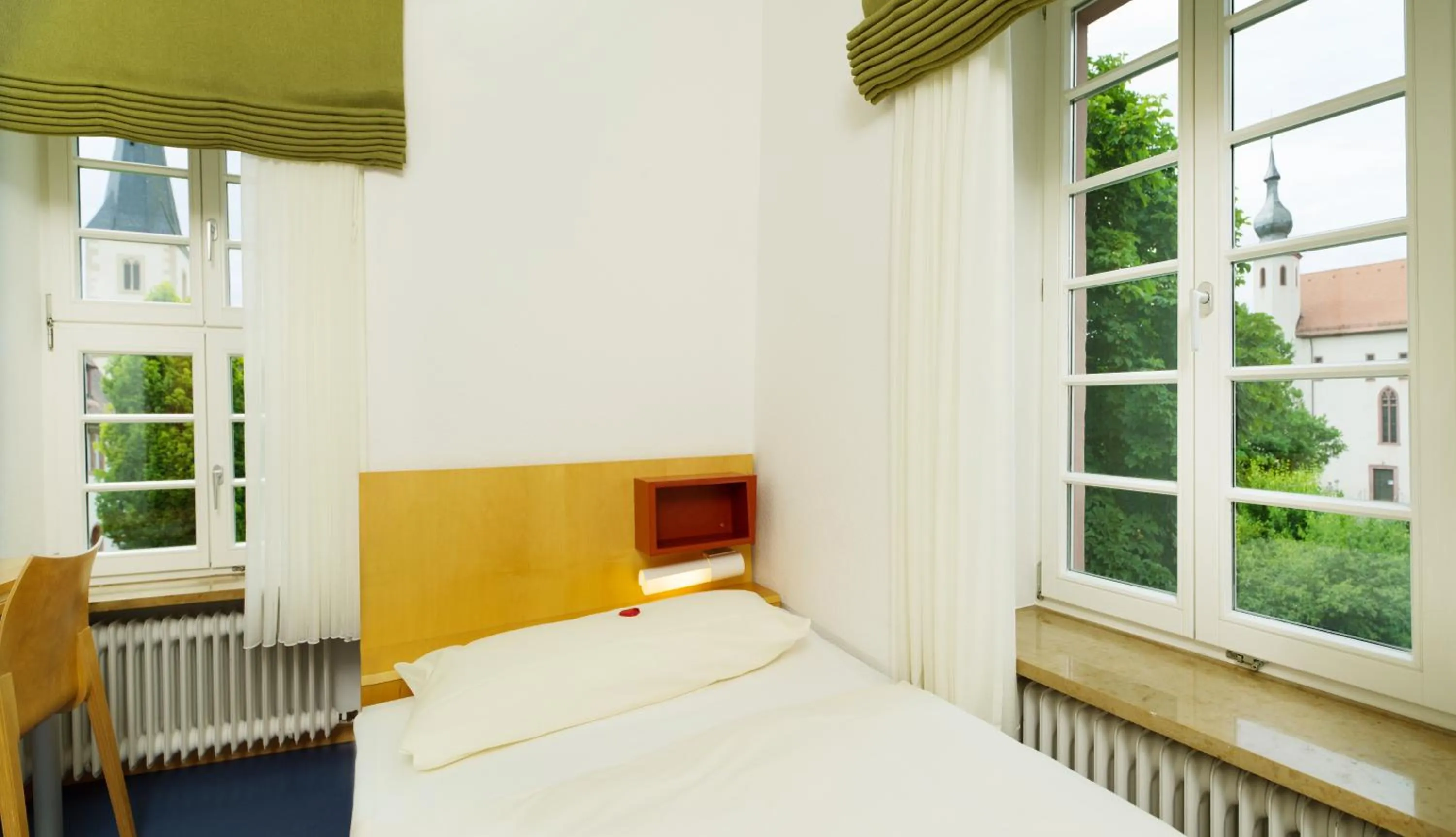 Photo of the whole room, Bed in Bildungshaus Neckarelz