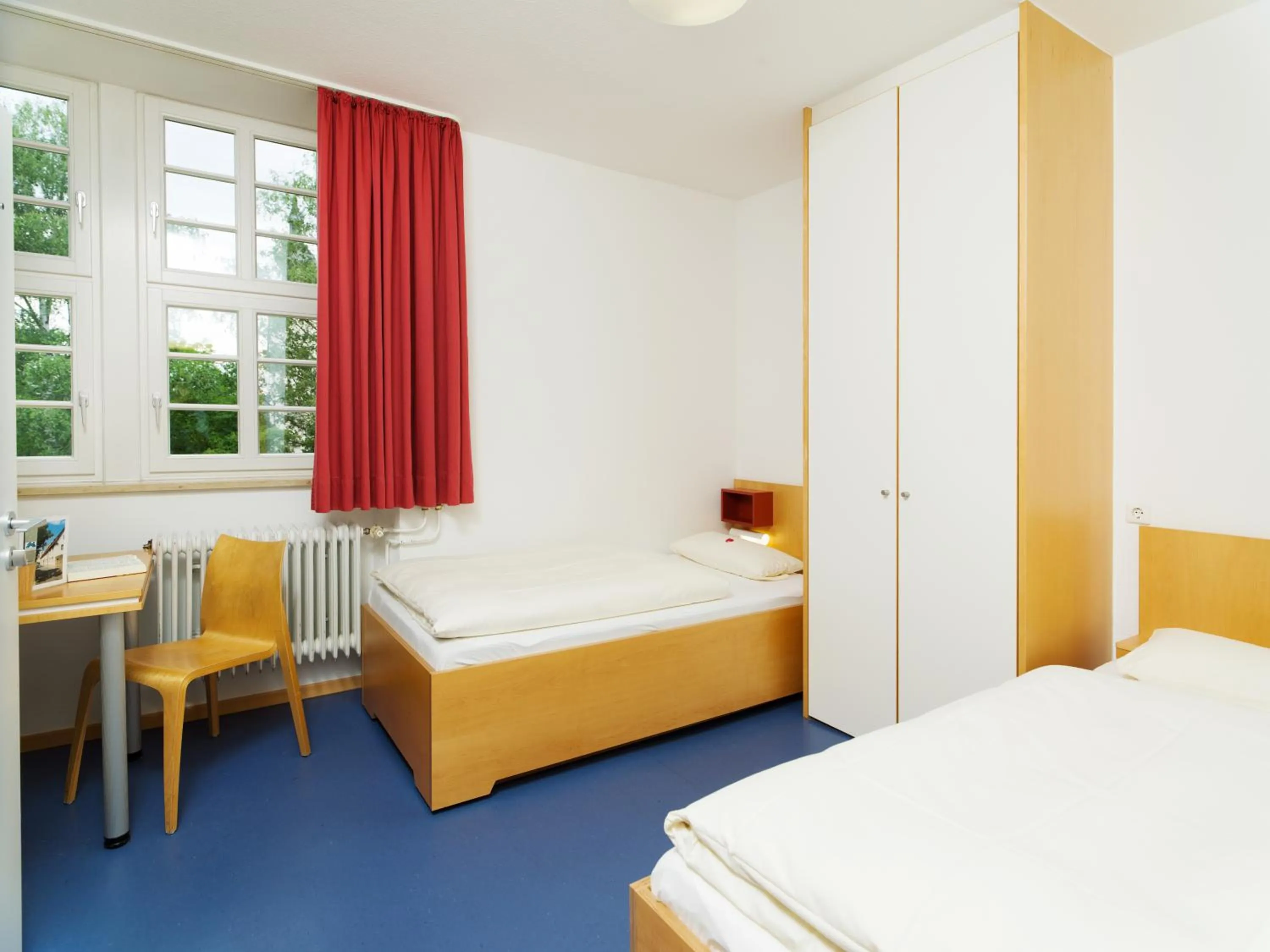 Photo of the whole room, Bed in Bildungshaus Neckarelz