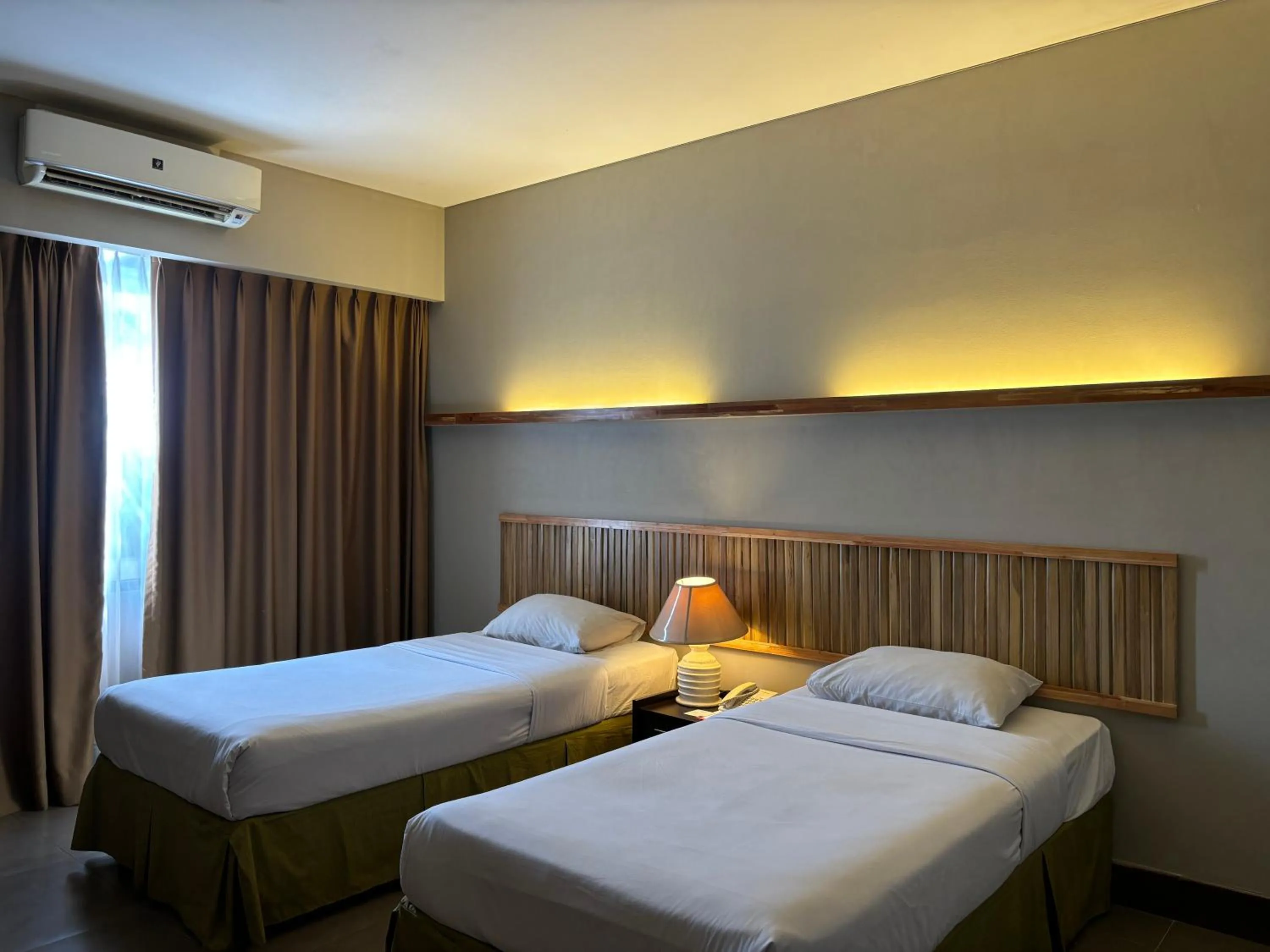 Bed in Bali World Hotel