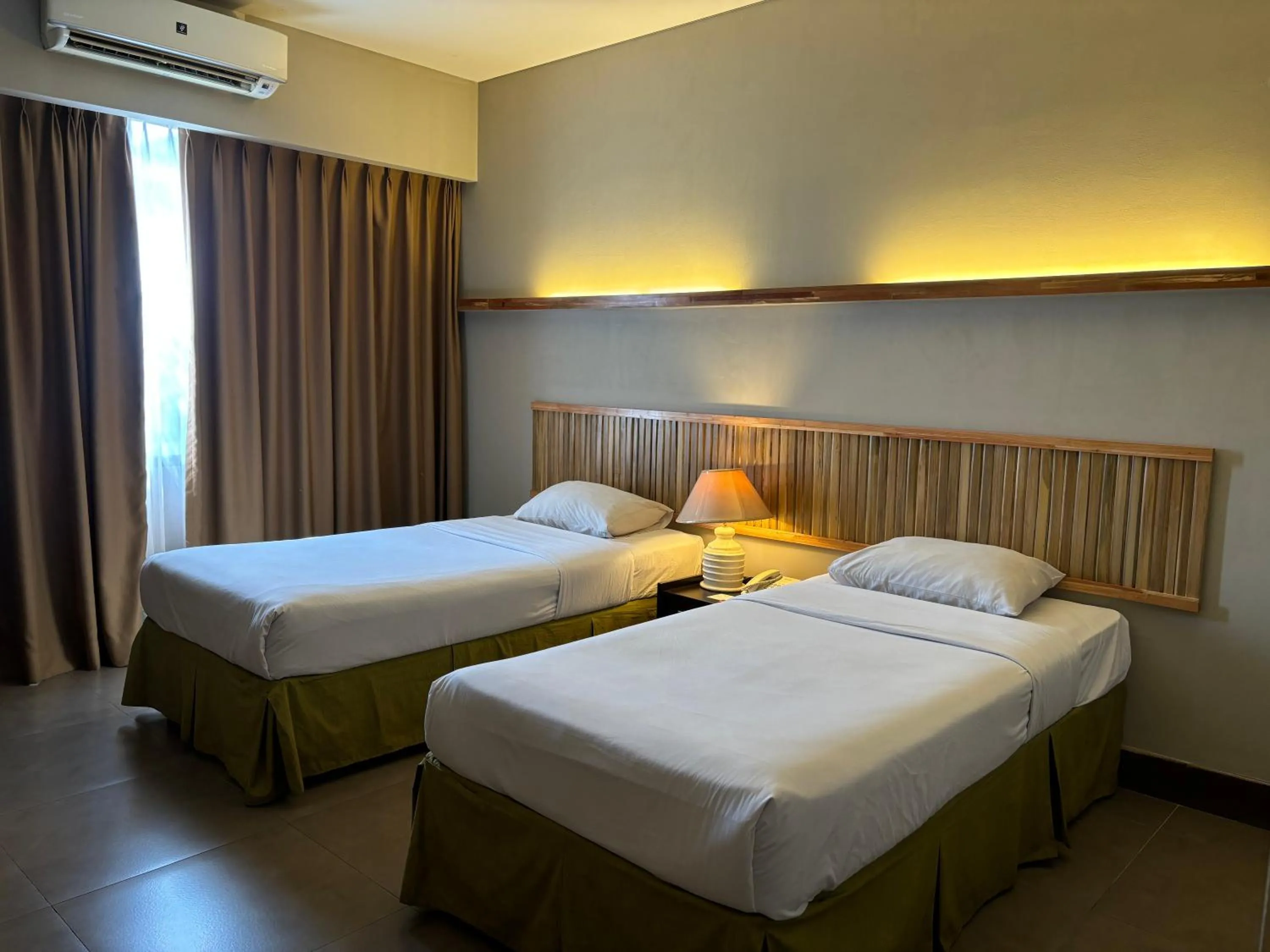 Bed in Bali World Hotel