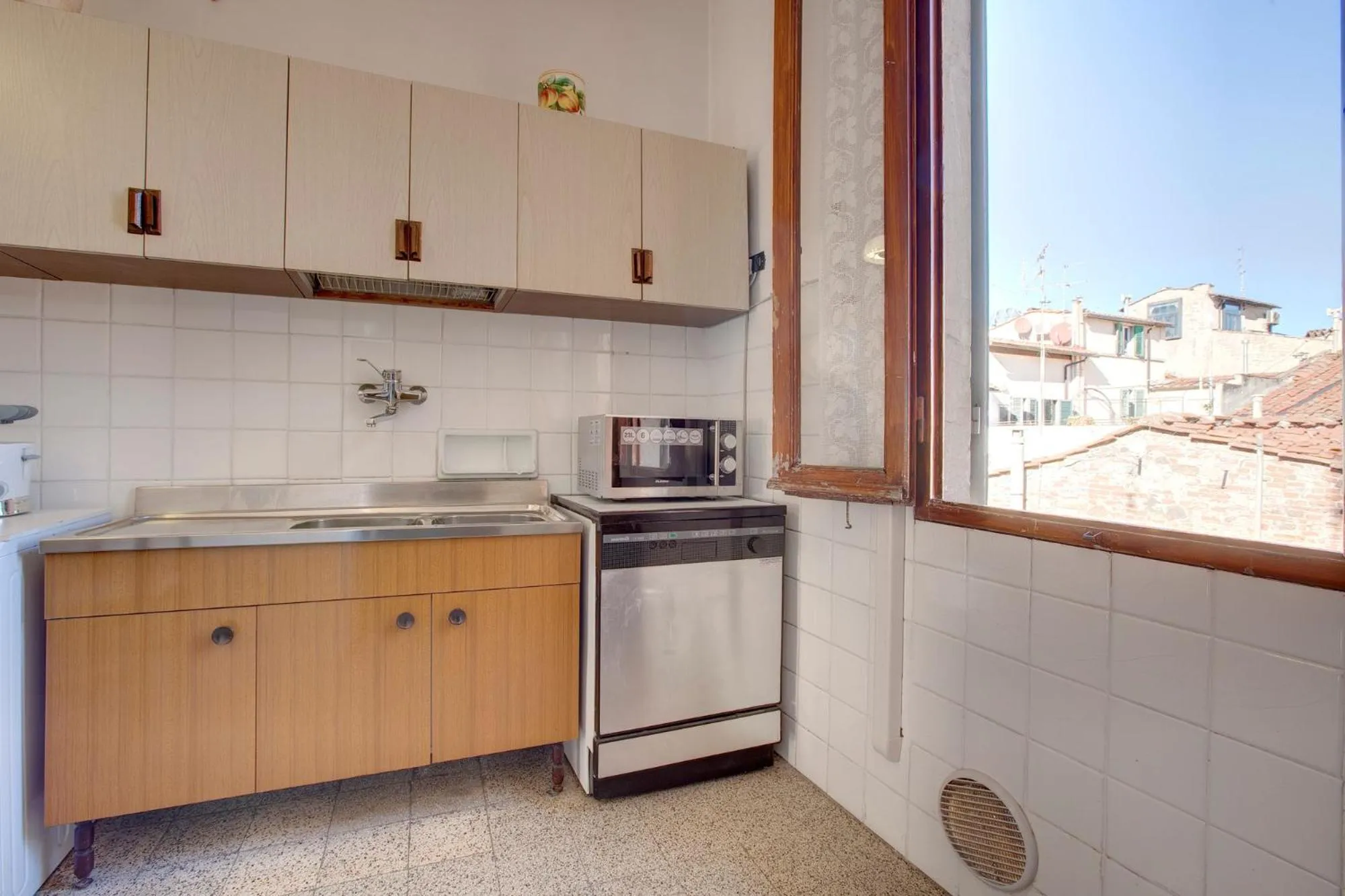 Kitchen or kitchenette in Appartamento Alfanihouse