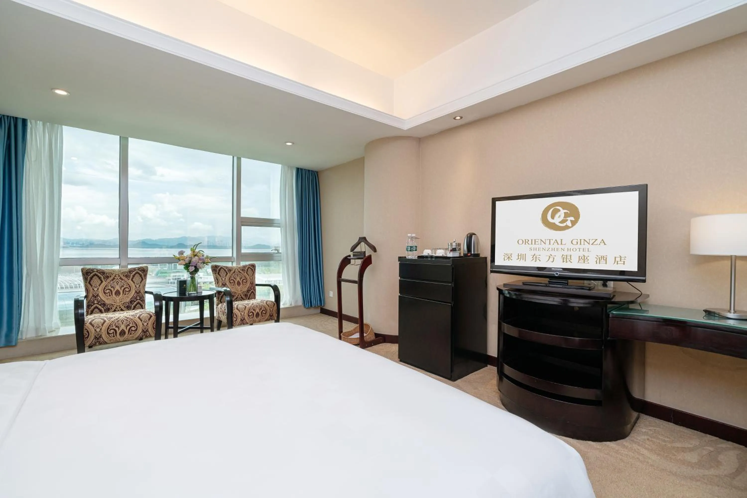 Bed in Oriental Ginza Hotel Shenzhen