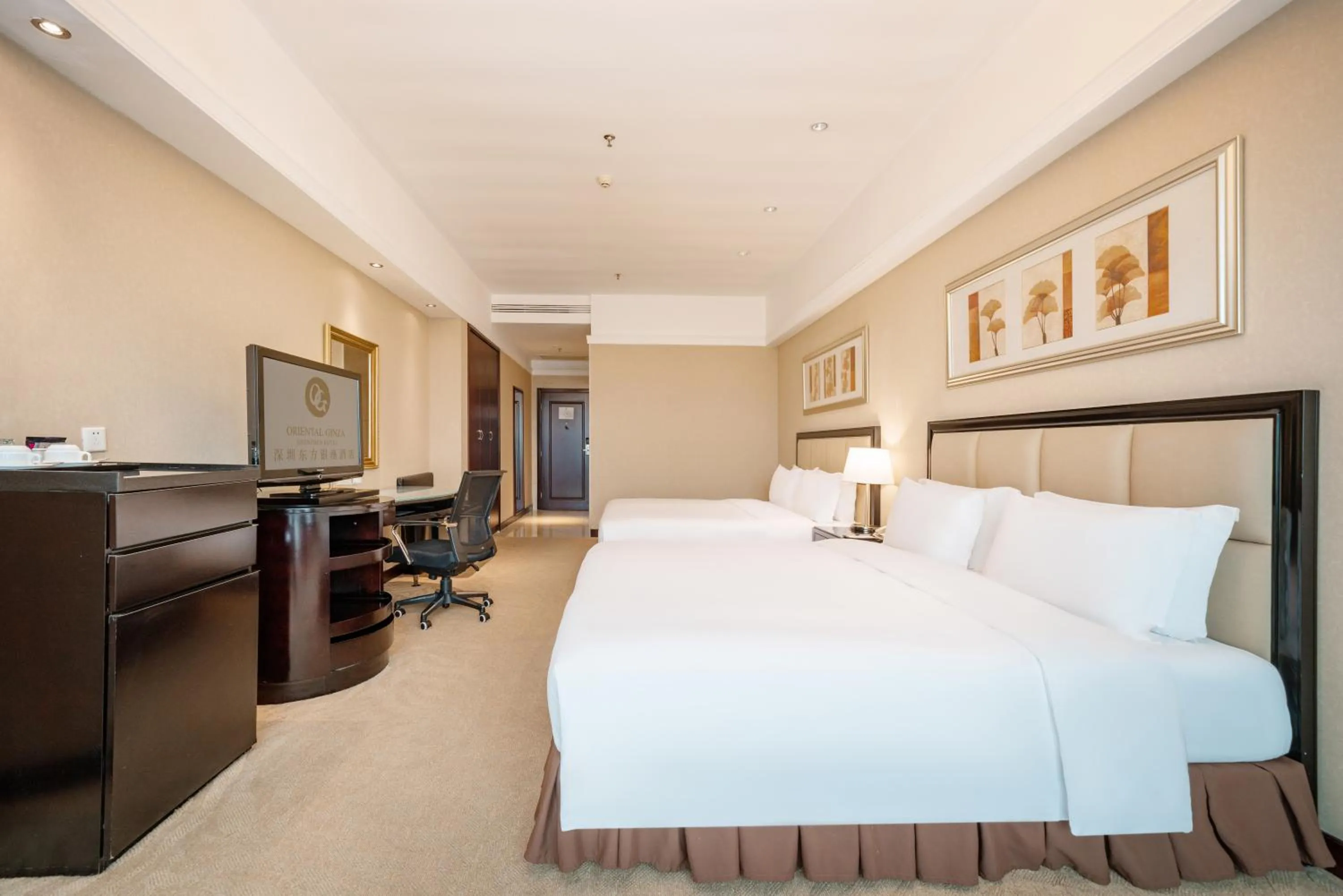 Bed in Oriental Ginza Hotel Shenzhen