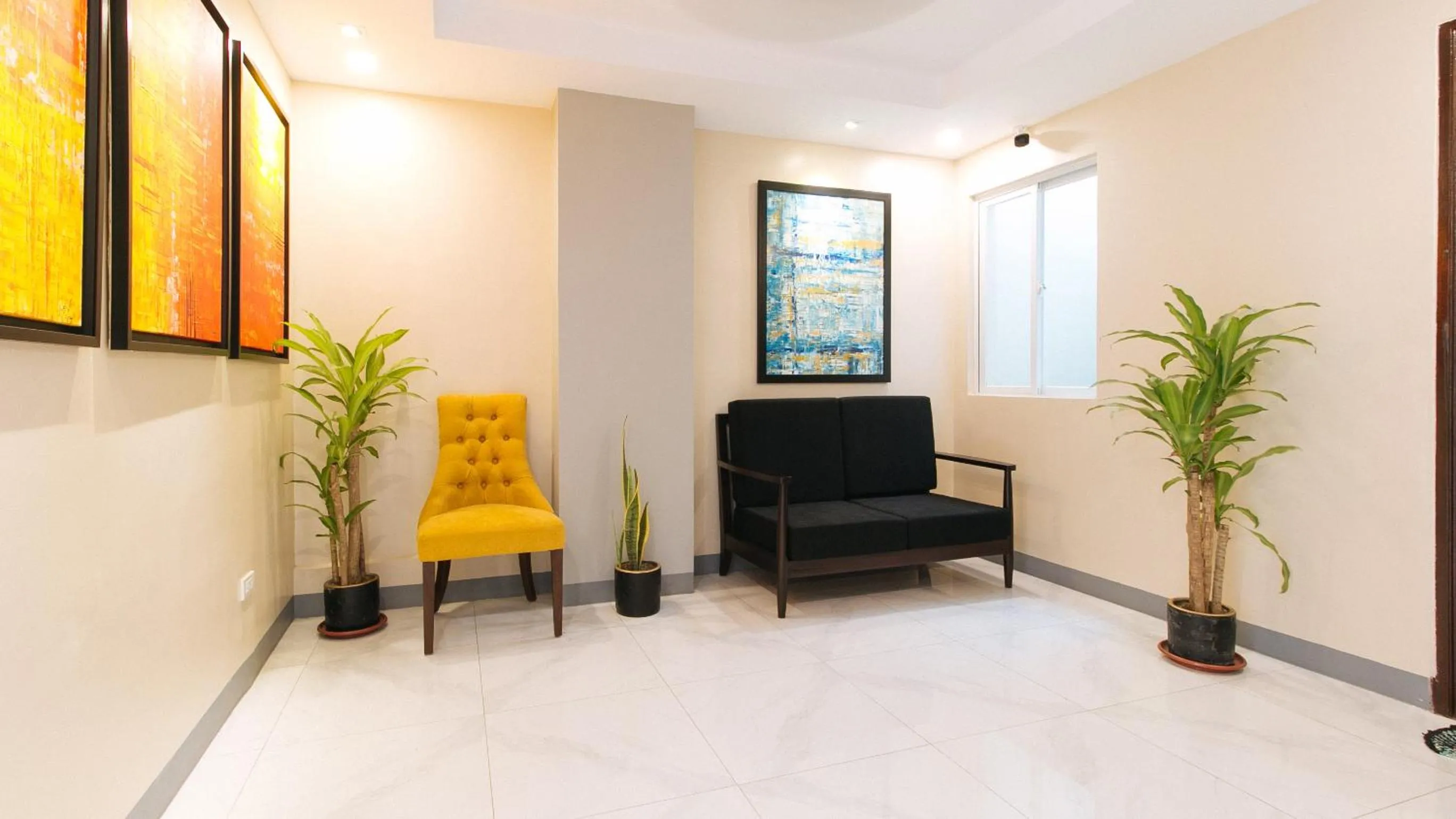 Seating area in RedDoorz Plus @ Torre De Manuel Residences 1