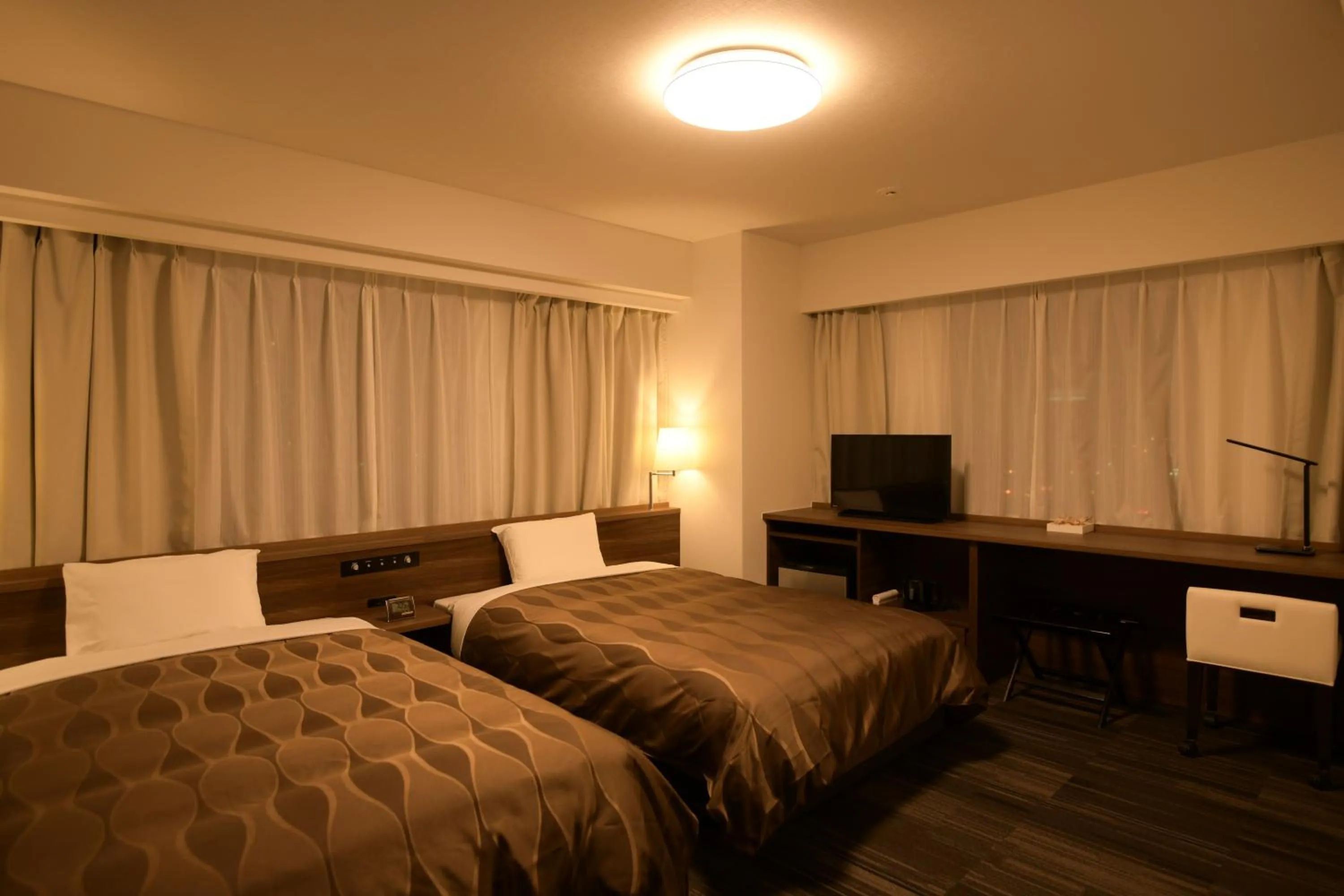 Photo of the whole room, Bed in Sakura Hotel Onomichi Ekimae