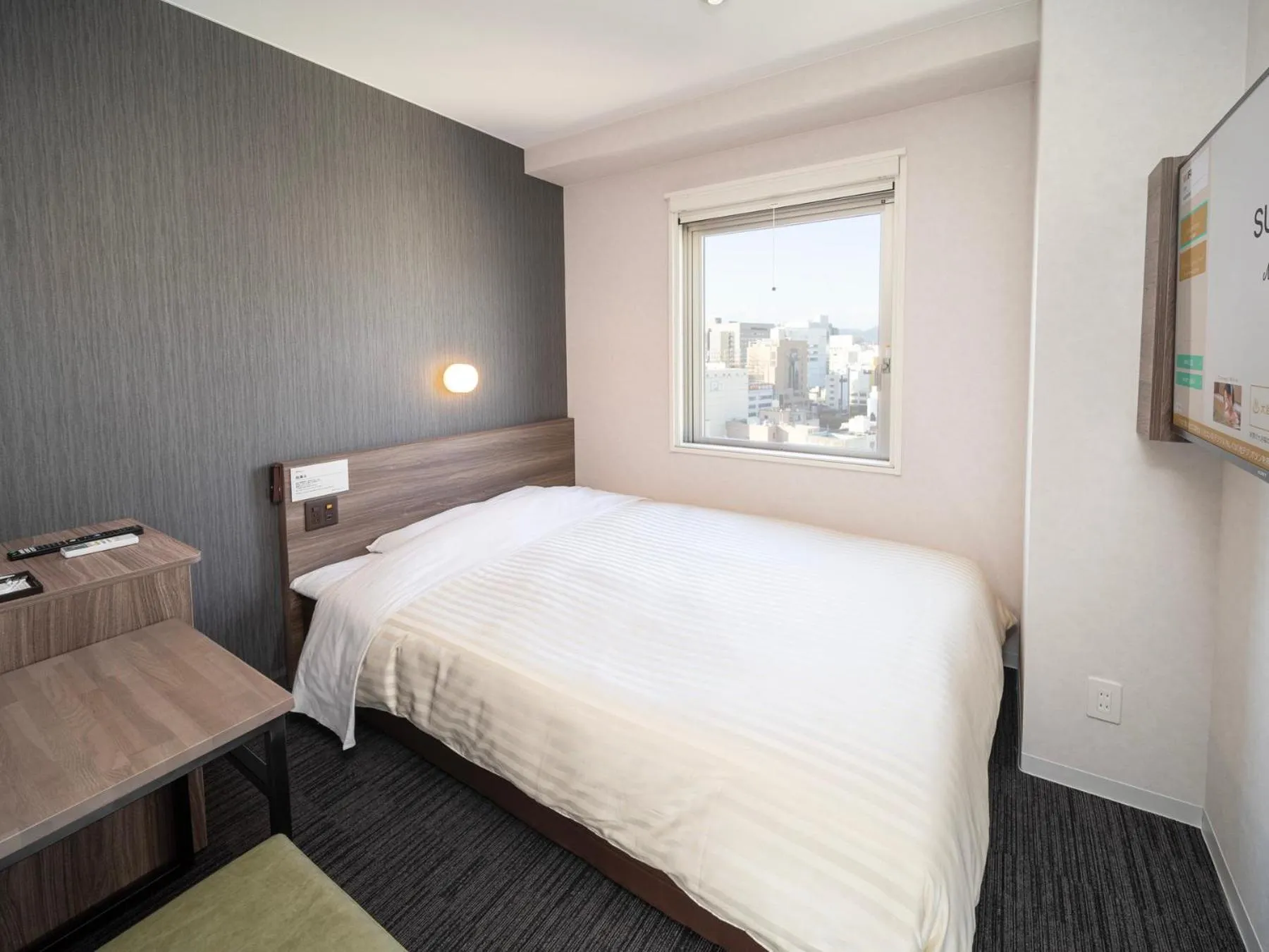 Bed in Super Hotel Hiroshima Yagenboridori