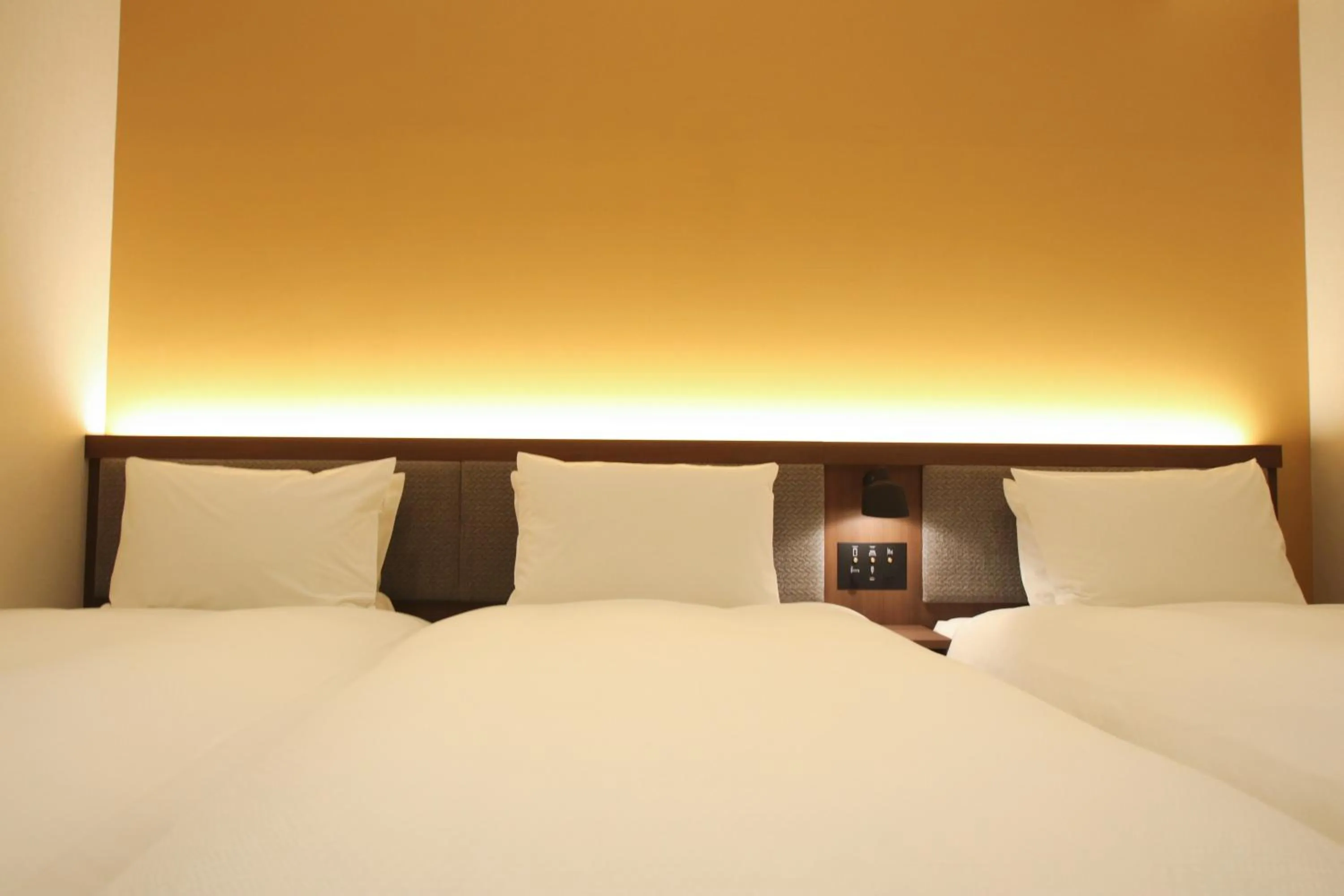 Bed in Hotel The M's Kyoto