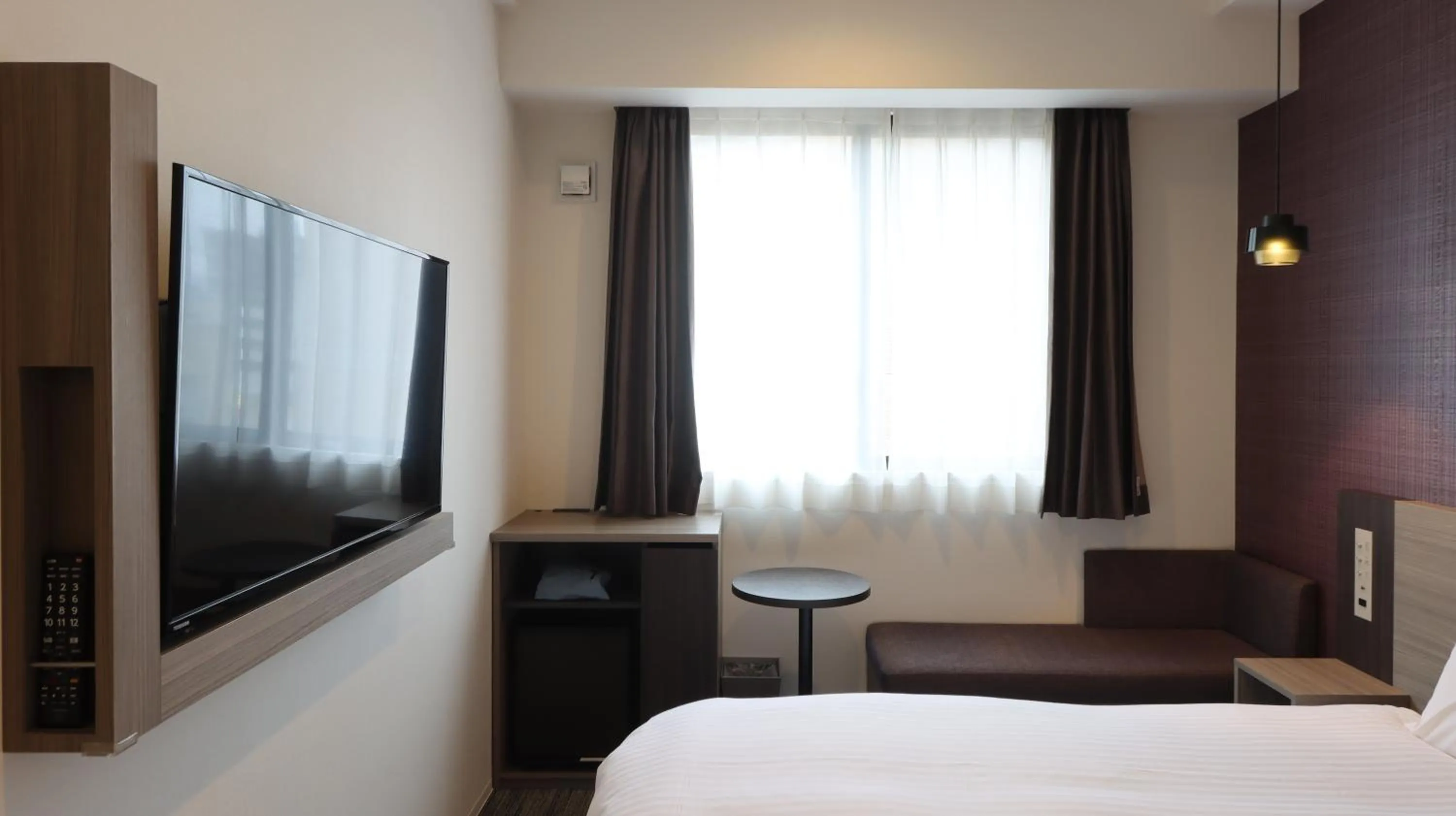 Bed in Wander Kyoto Nanajo