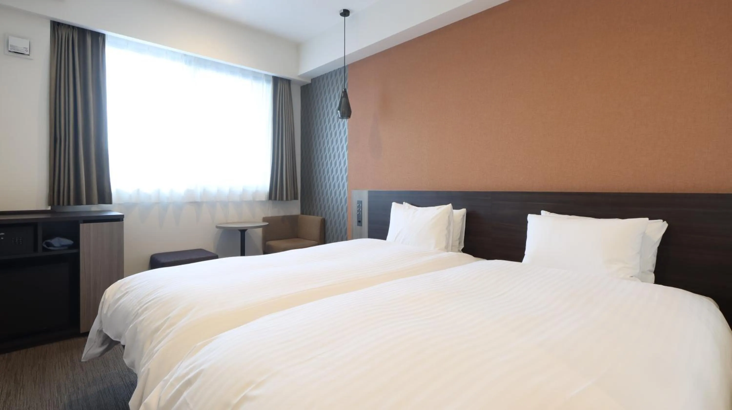 Bed in Wander Kyoto Nanajo