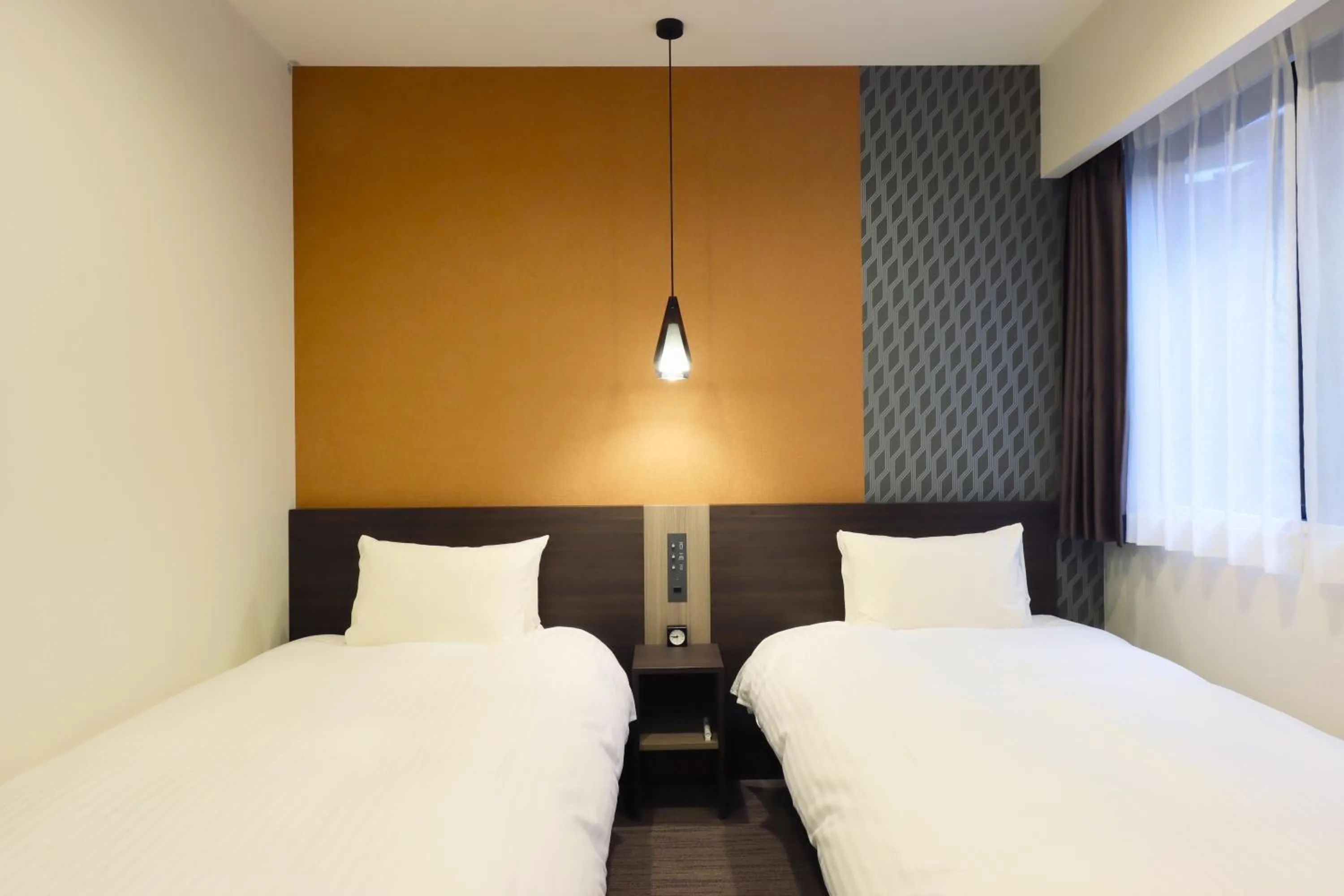 Bed in Wander Kyoto Nanajo