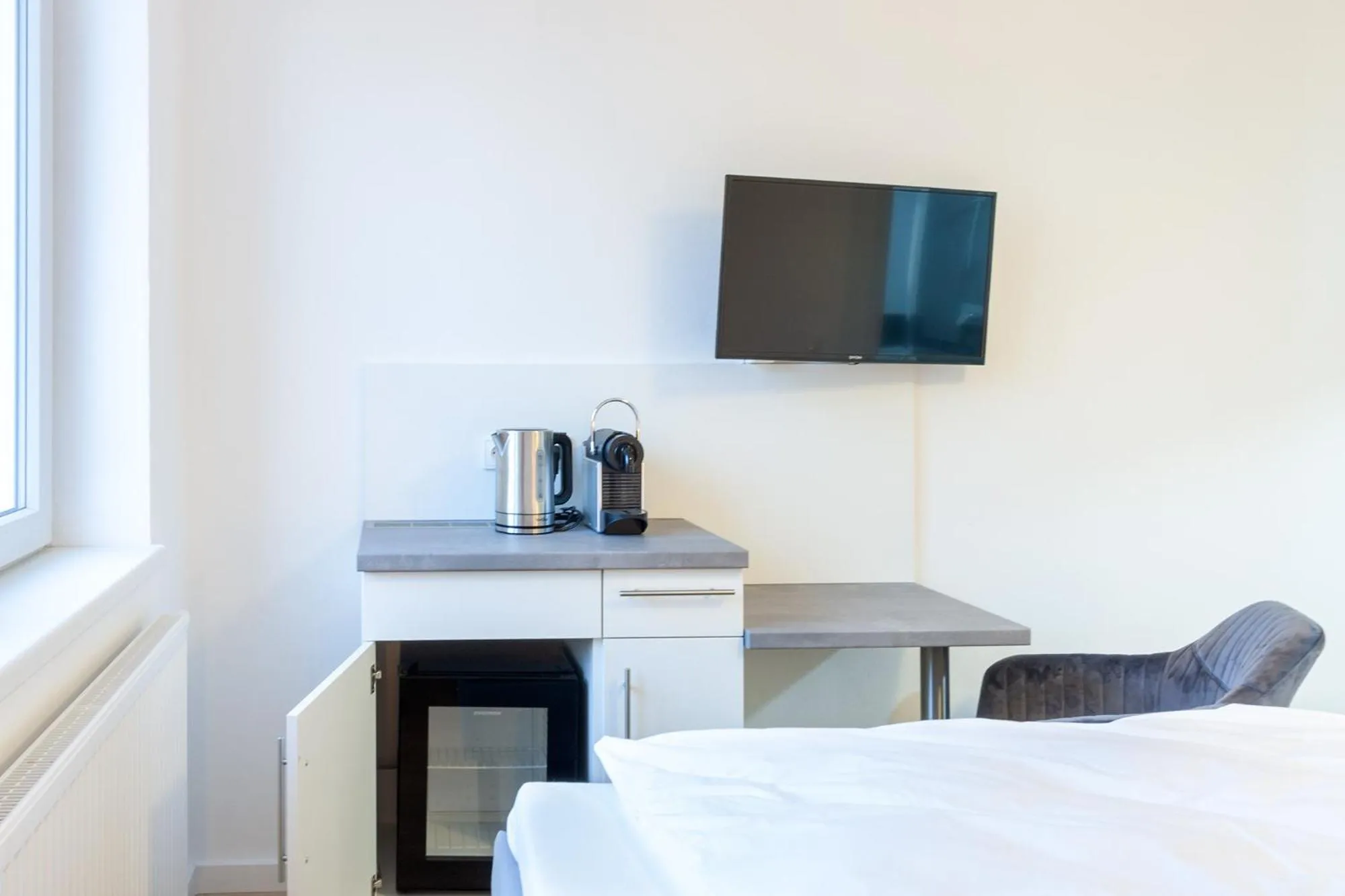 TV and multimedia, Bed in STAY@MA Boardinghouse Mannheim