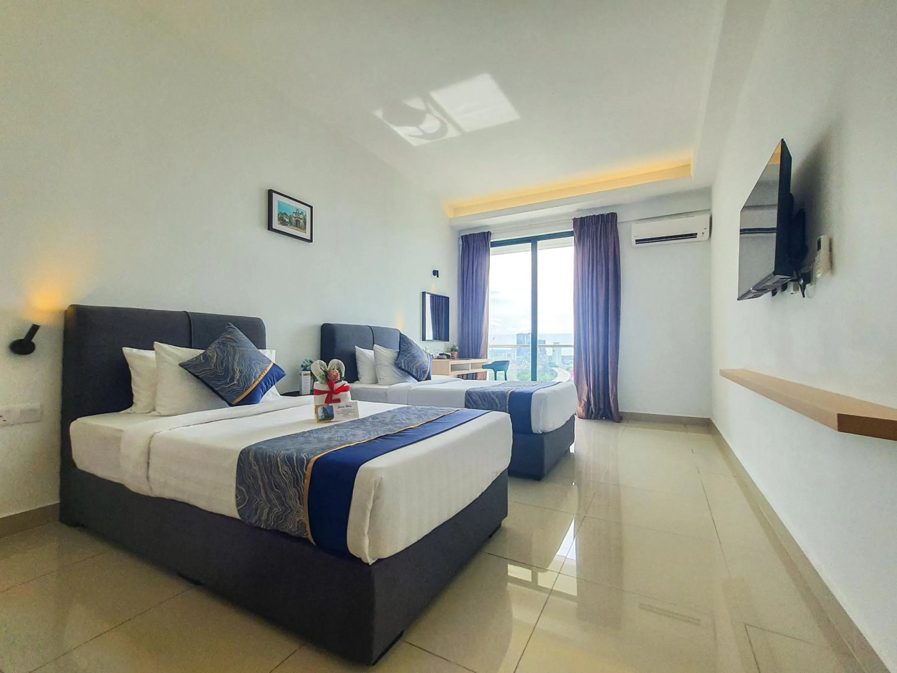 Bed in Swan Garden Resort Hotel