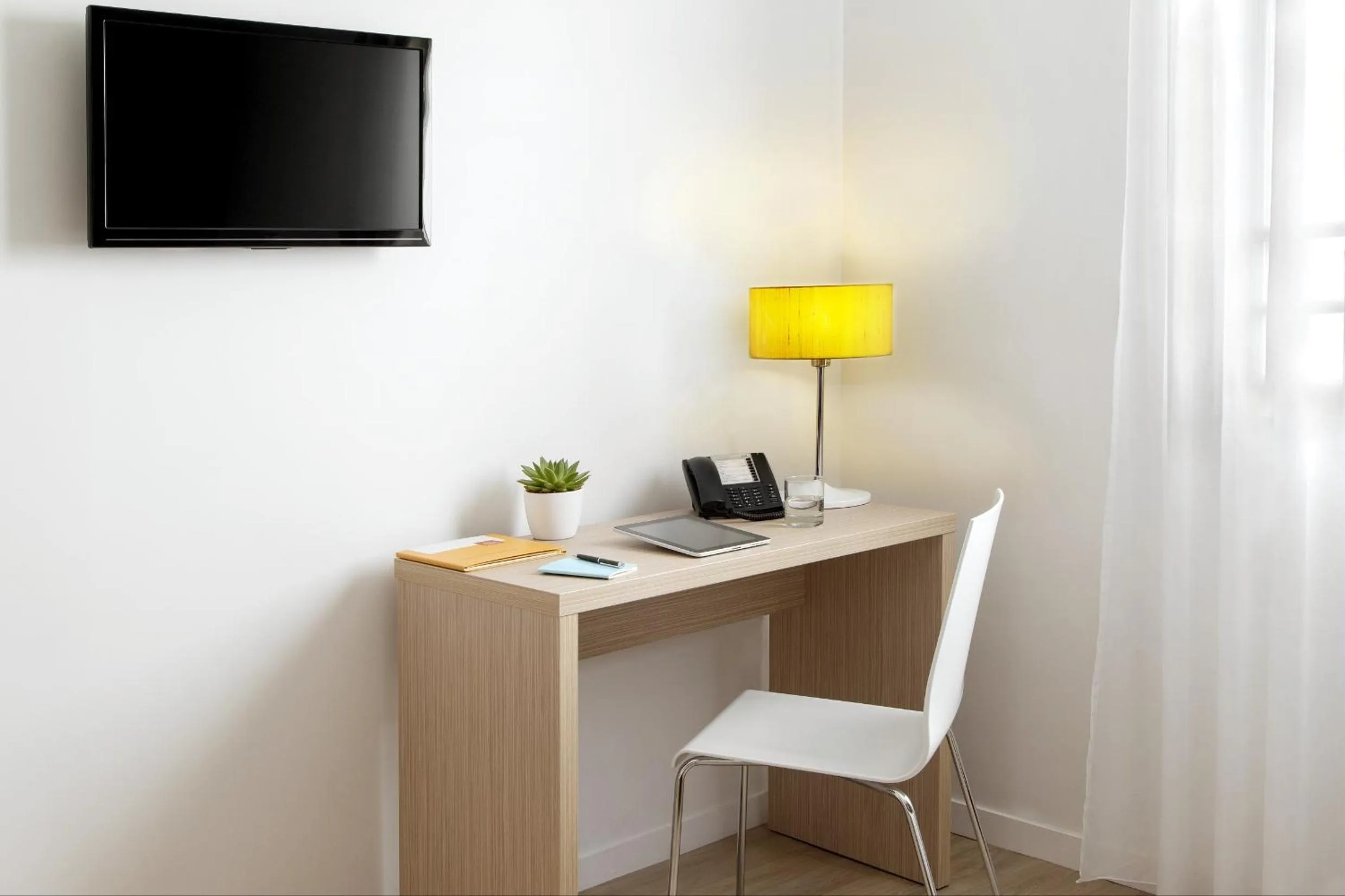 Seating area in Aparthotel Adagio Access Paris Clichy