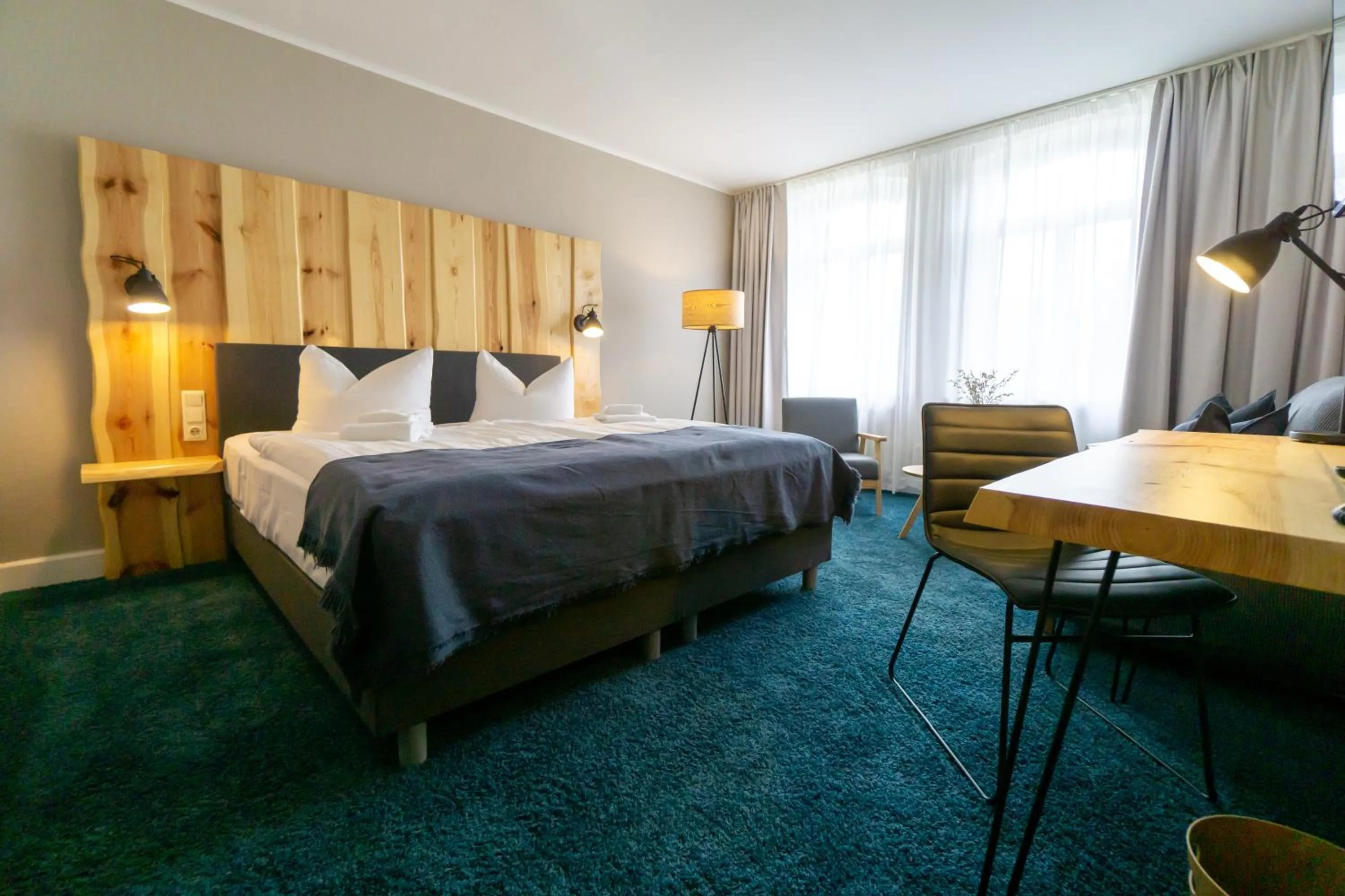 Photo of the whole room, Bed in Waldhotel Eiche