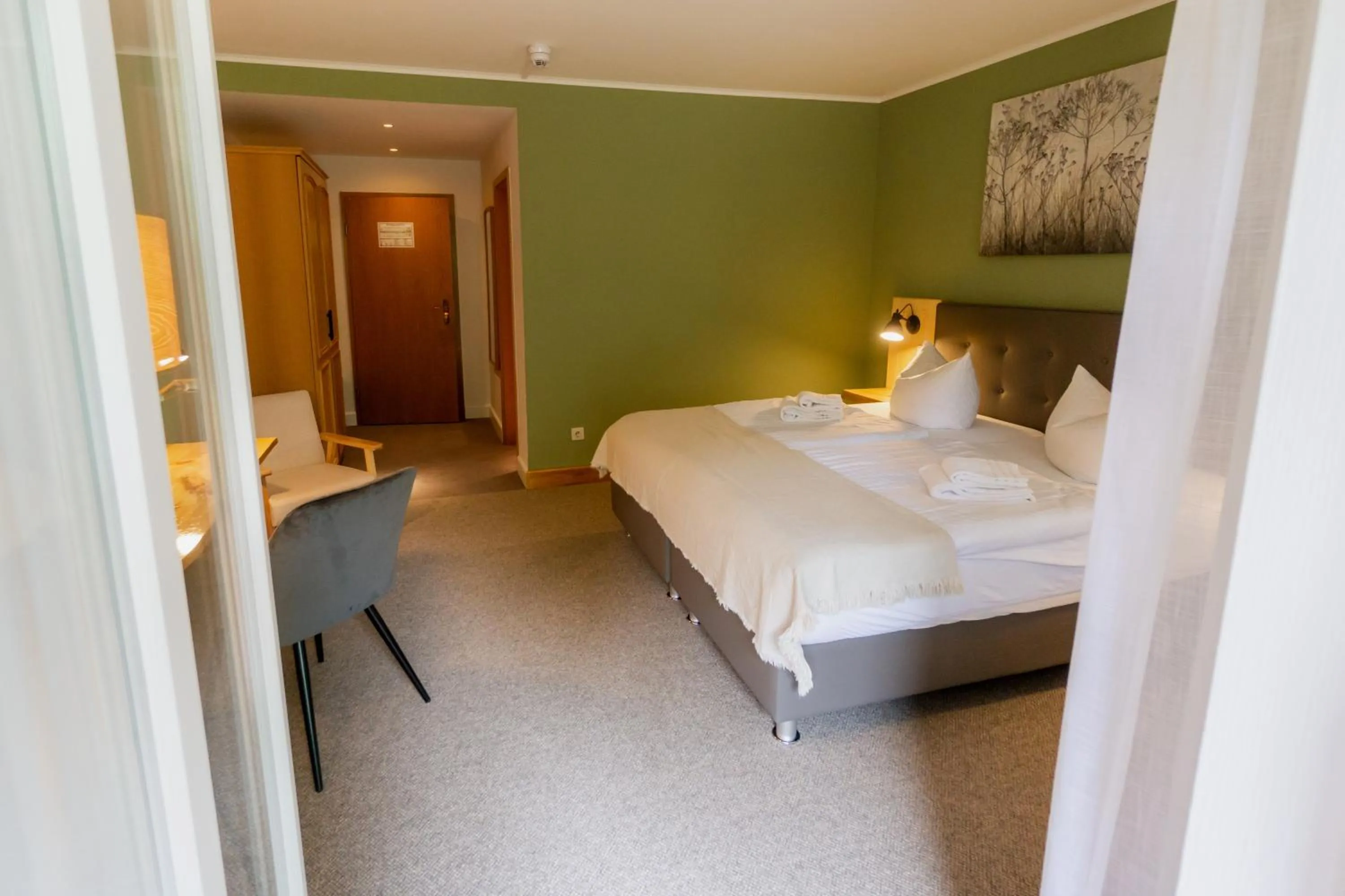 Photo of the whole room, Bed in Waldhotel Eiche