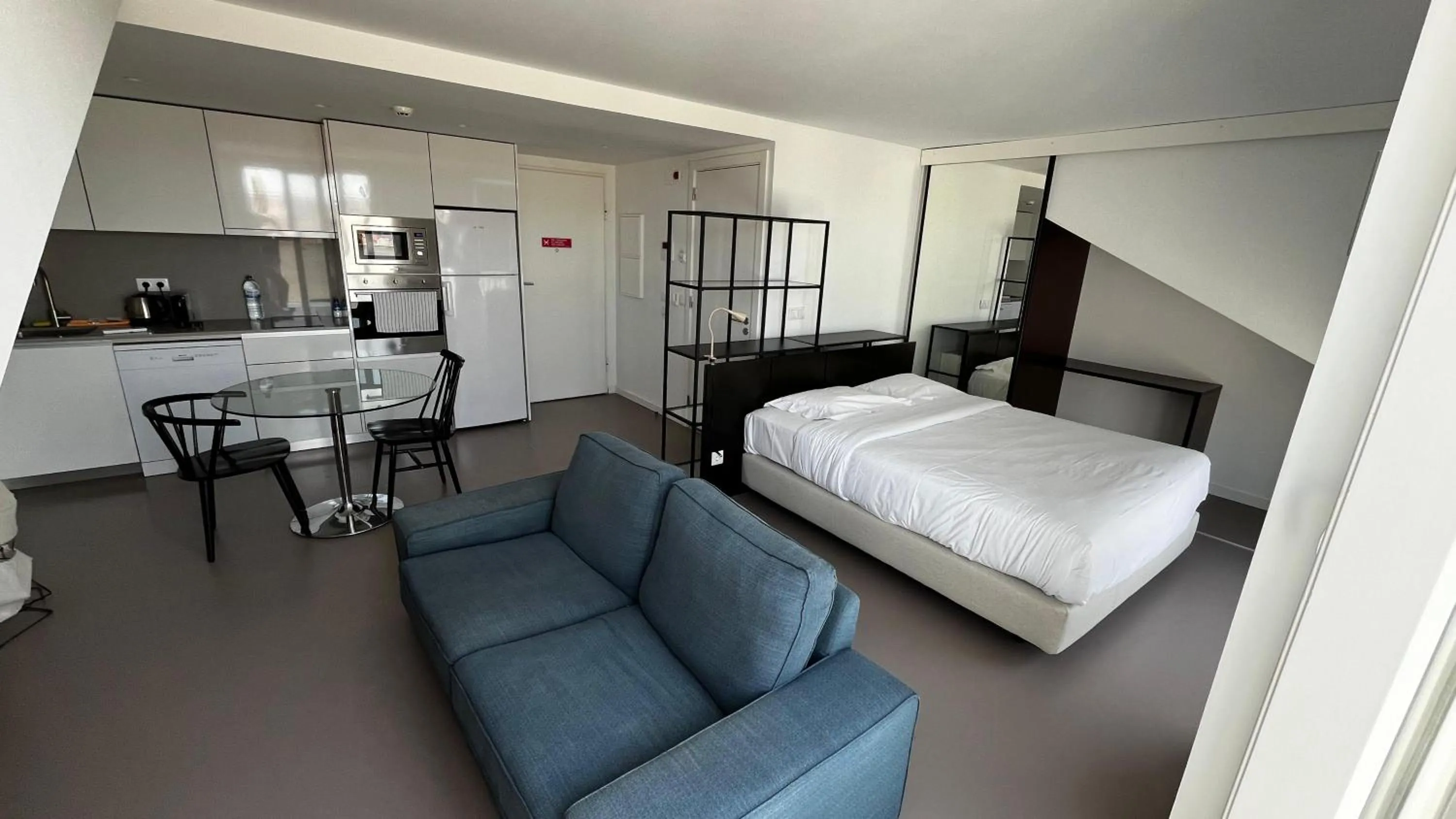 Bed in Oscar Concept Apartments