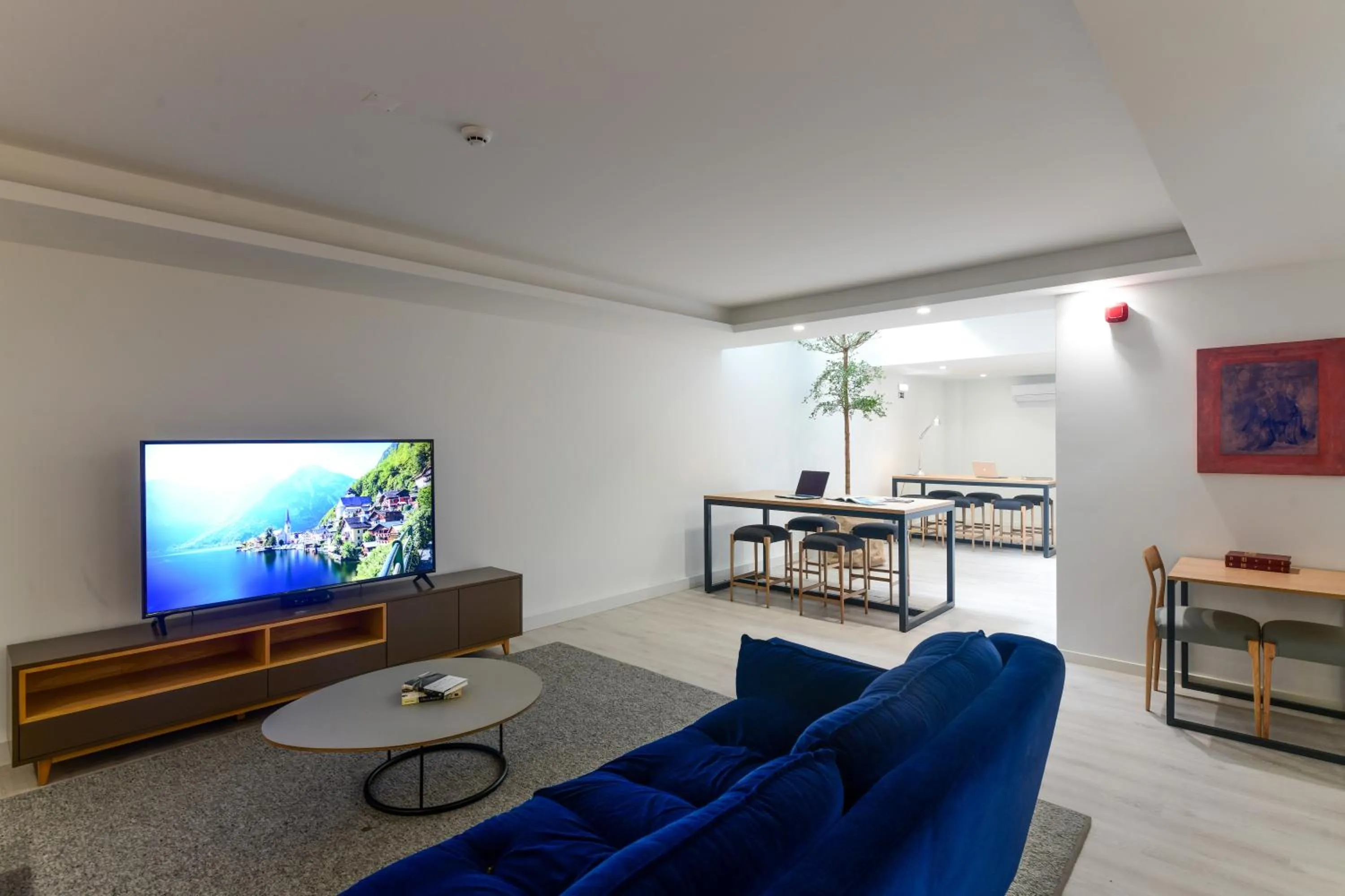 Communal lounge/ TV room in Oscar Concept Apartments
