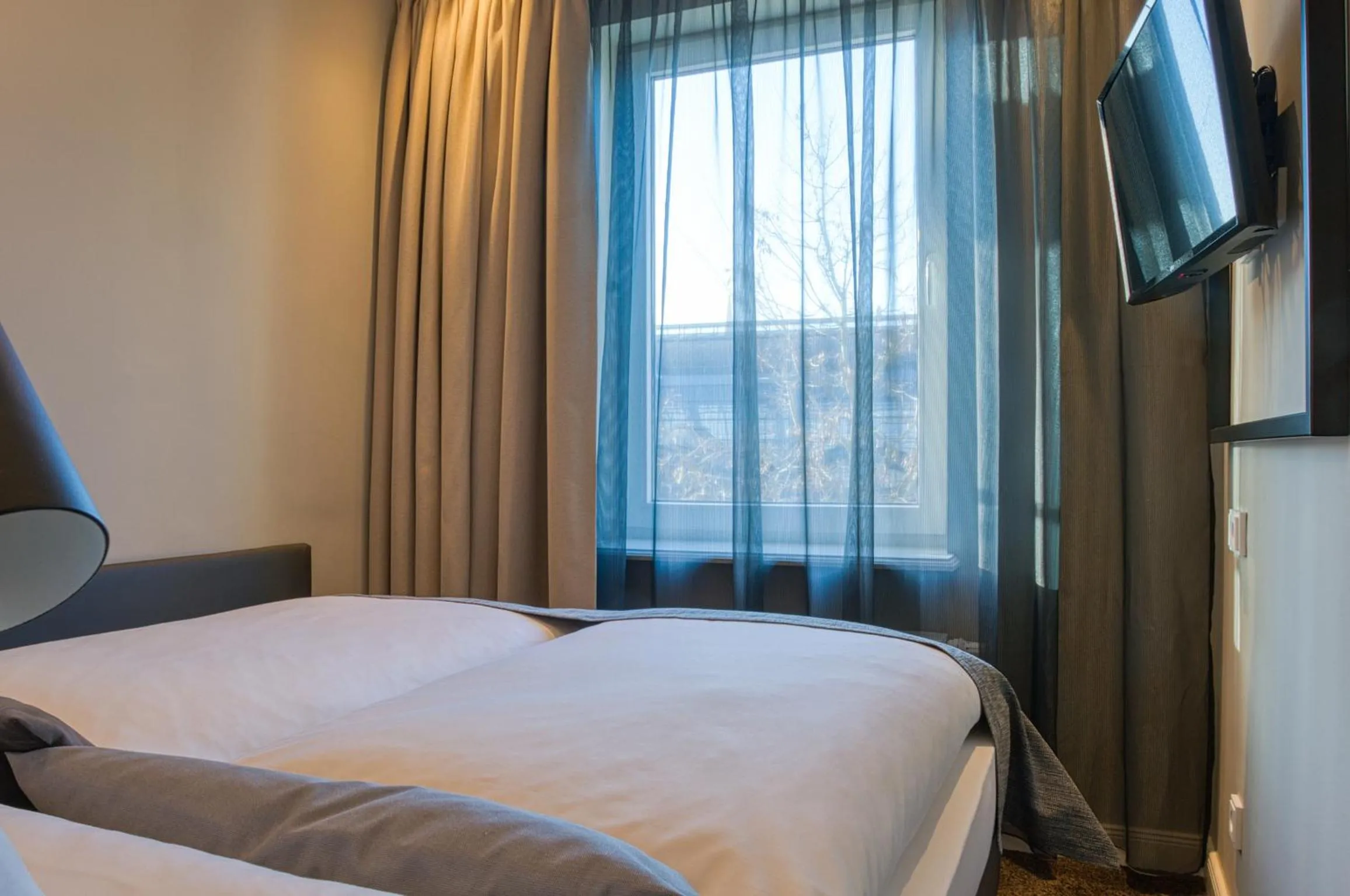 Photo of the whole room, Bed in Boutique 53 & 56 Hamburg City, Trademark Collection by Wyndham